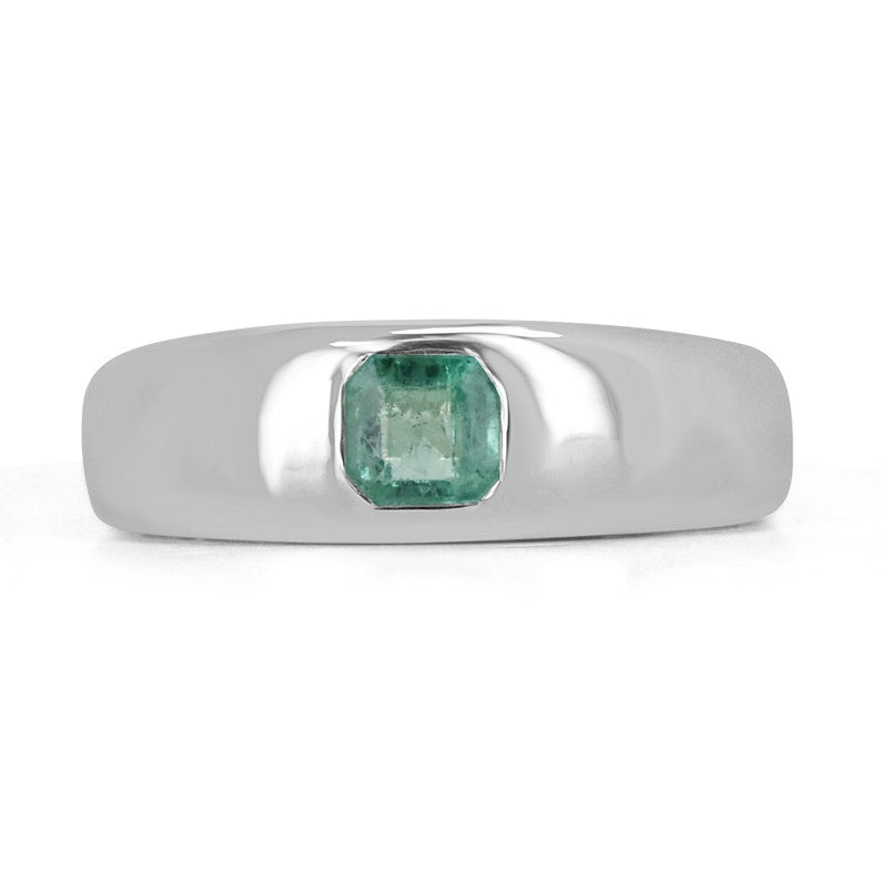 Asscher cut pinky ring featuring a 0.95 carat emerald gemstone set in sterling silver, bezel style, unisex design by Colombian Emerald.