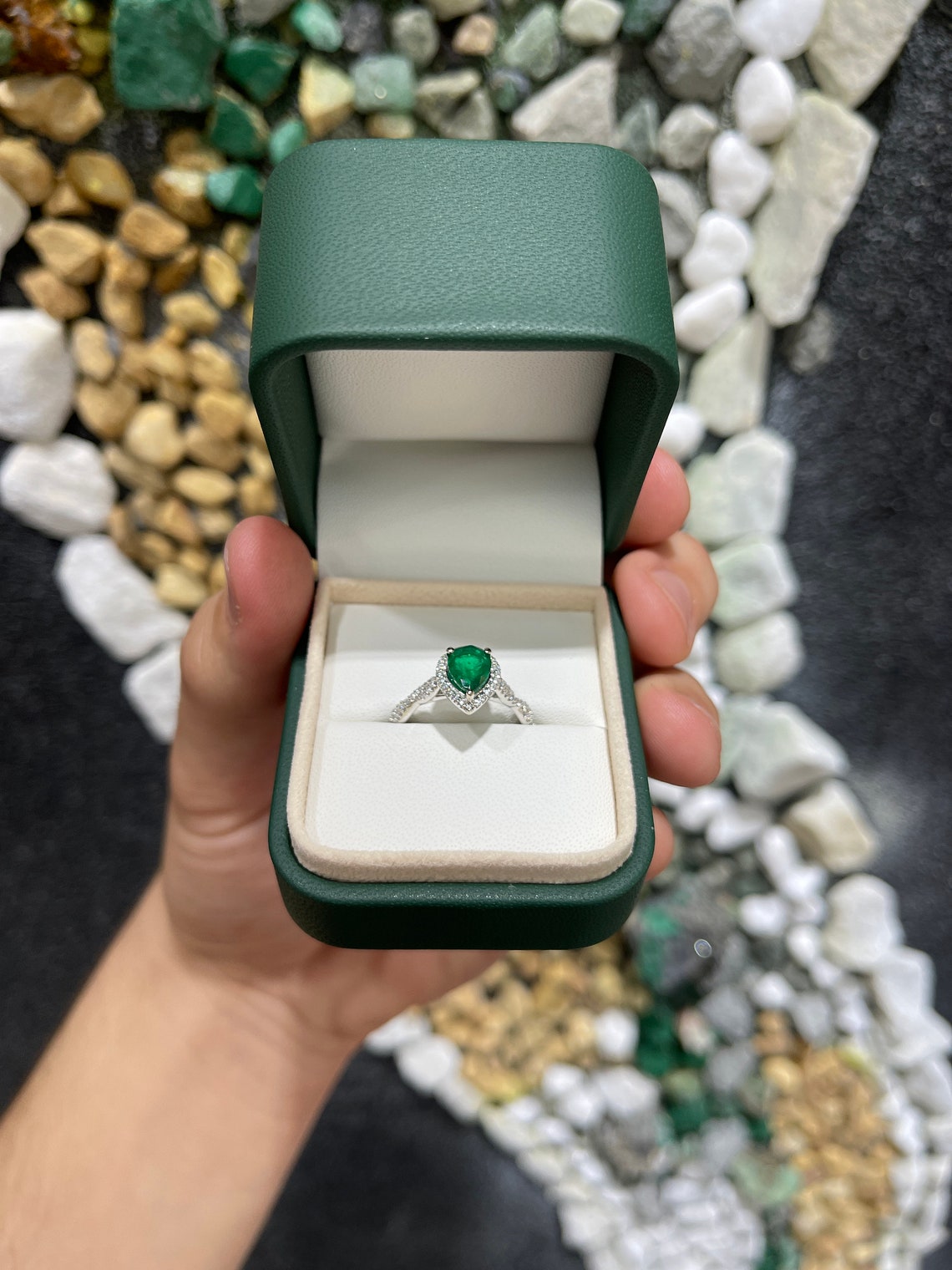 Natural emerald pear-cut engagement ring with diamond halo accents in 14K gold, by Colombian Emerald.