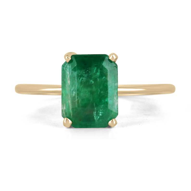 14K gold emerald solitaire ring with 2.10 carats of natural Colombian emerald, featuring a four-prong setting on a sleek band.