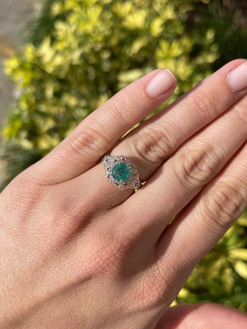 Colombian Emerald engagement ring with 2.14 carat deep ocean green cushion cut emerald and diamond accents in 14K gold