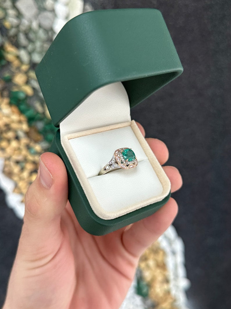 Colombian Emerald engagement ring featuring a 2.14tcw deep ocean green cushion cut emerald with diamond accents in 14K gold.