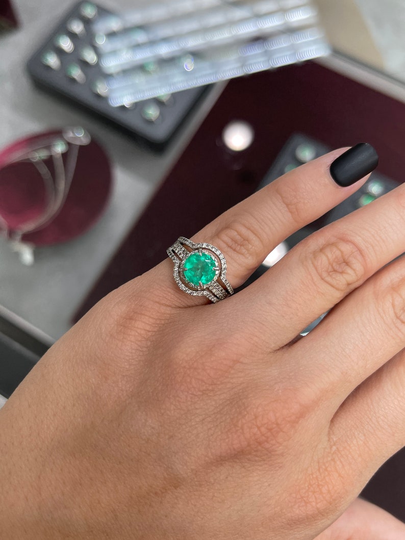 14K Colombian Emerald and diamond halo engagement ring with round cut emerald, 3.40tcw, featuring intricate ring design