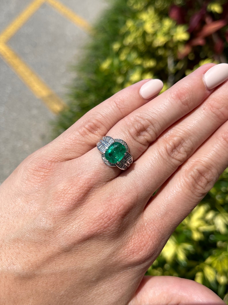 Antique 3.77ctw Colombian emerald oval cut ring with white gold band and diamond accents, crafted by Colombian Emerald.