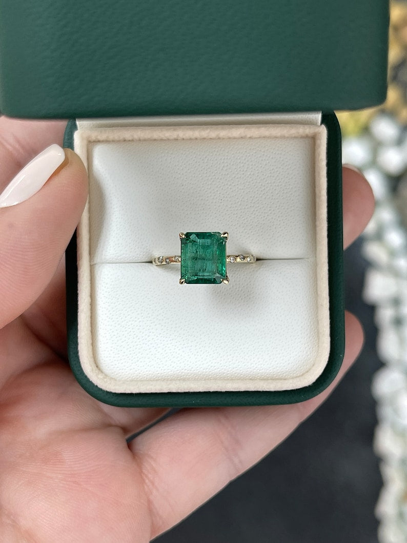 14K Colombian Emerald engagement ring with 2.68tcw dark emerald and diamond accents, showcasing elegant ring design.