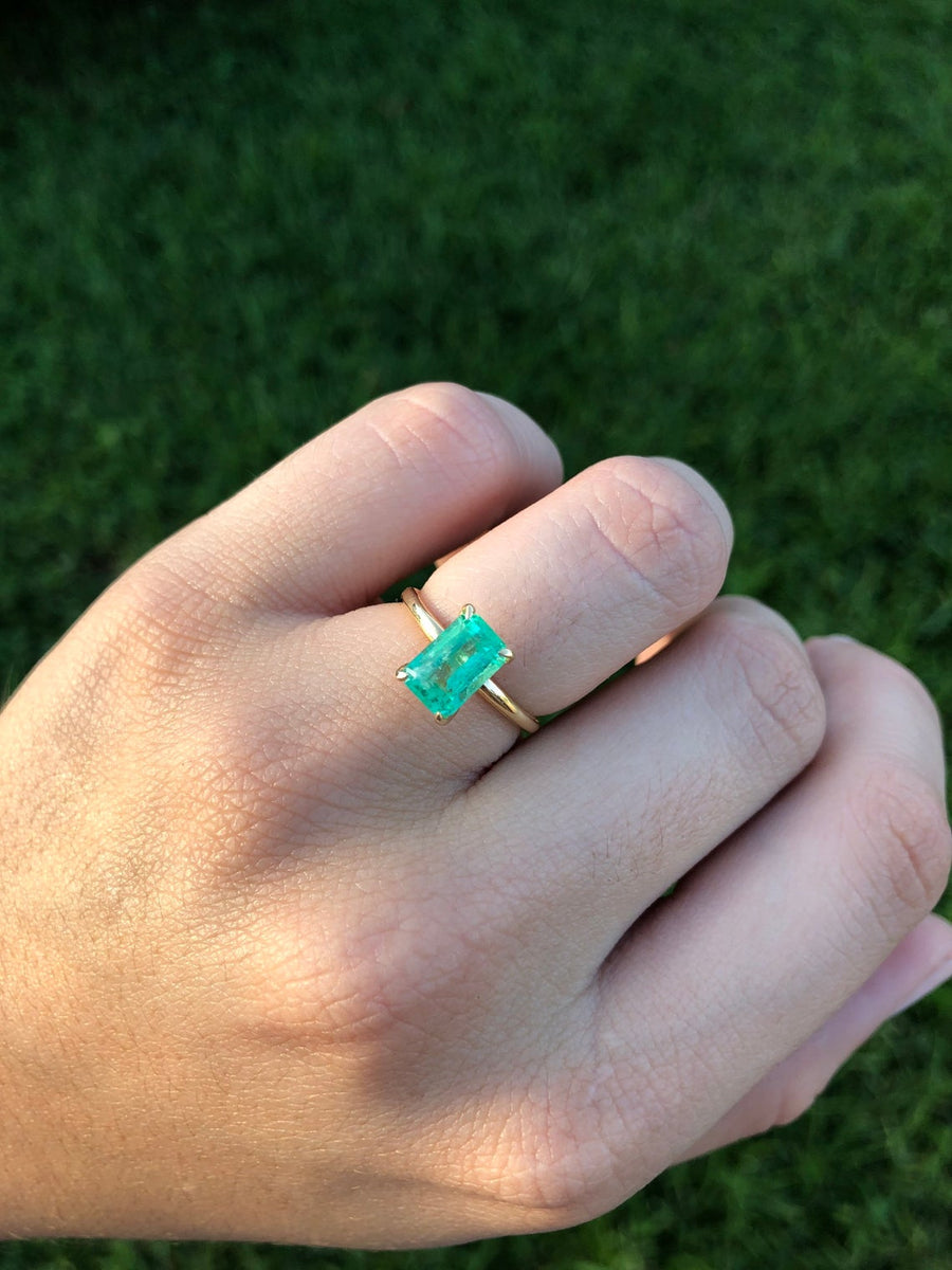 Chic and Sophisticated: 1.50 Carat Emerald Solitaire Engagement Ring in 14K Gold