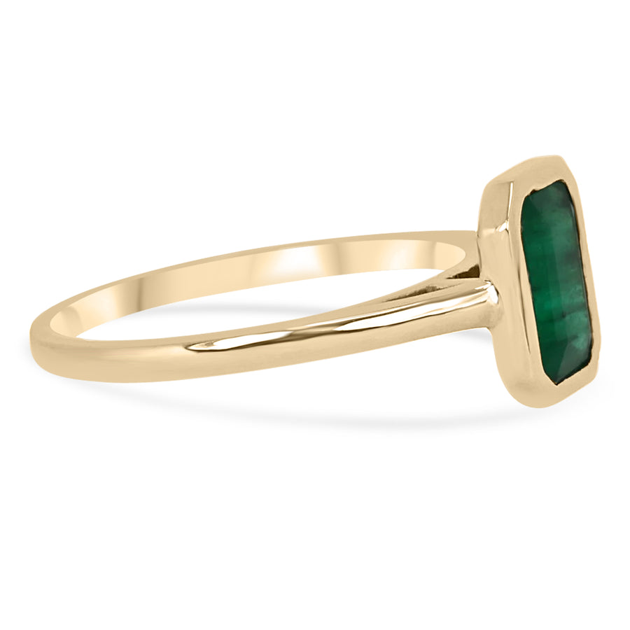 Chic and Timeless: 14K Gold Stackable Ring Featuring 1.10 Carat Bezel Set Dark Green Emerald Cut Emerald