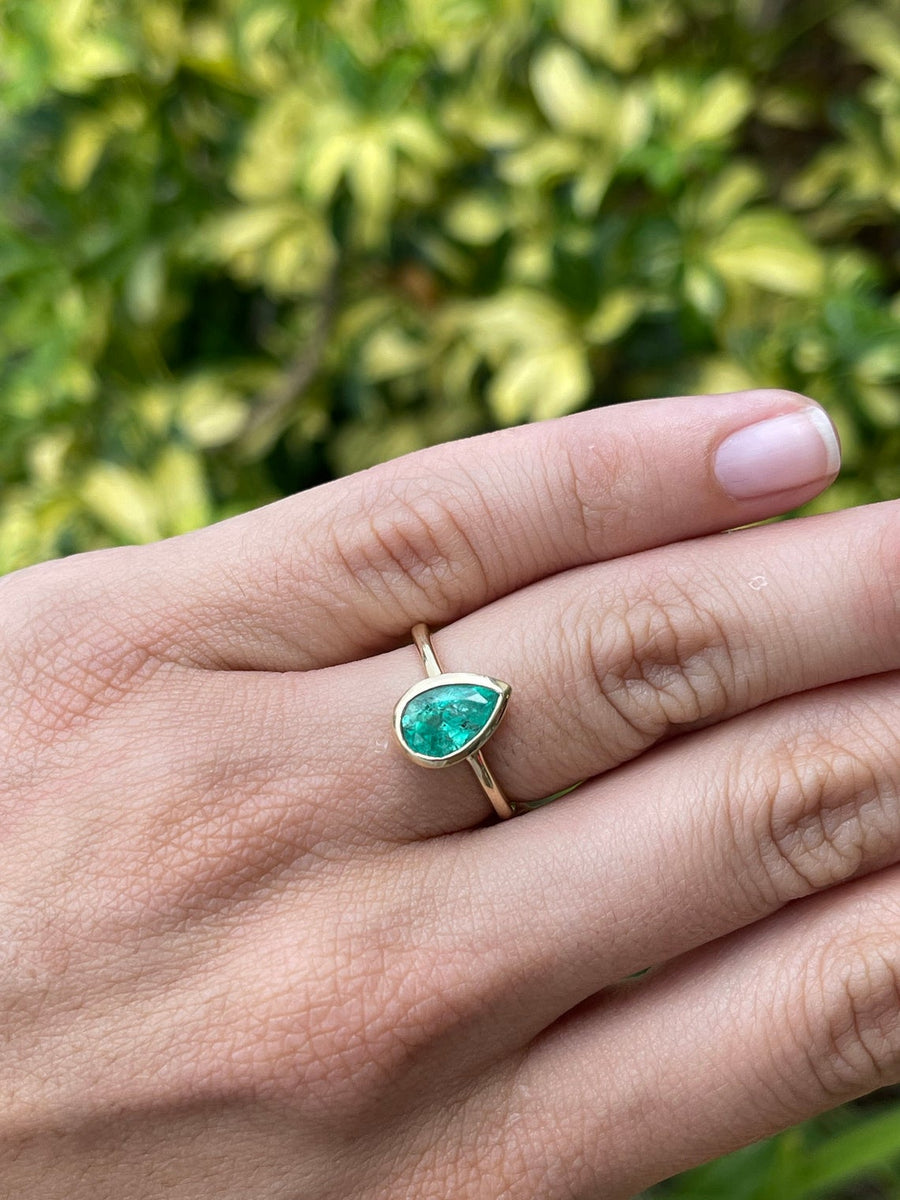 Emerald Bezel Solitaire Ring