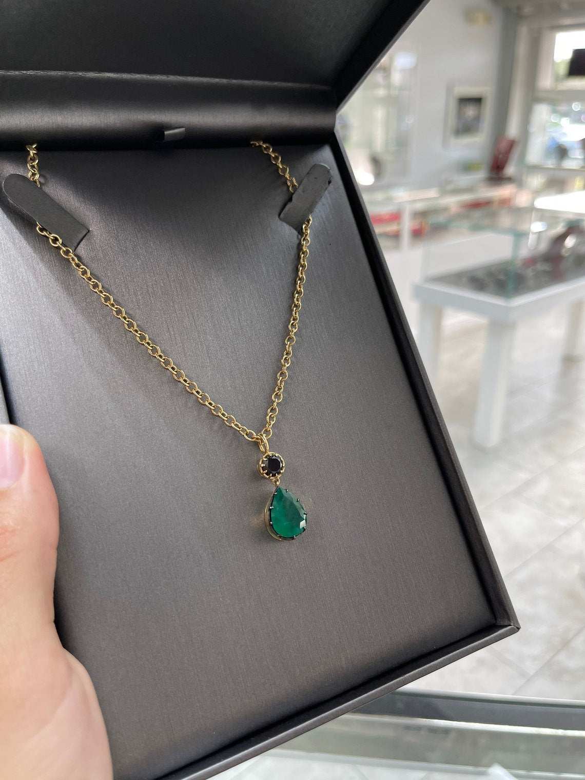 6.91ct 18K Pear Colombian Emerald & Round Black Diamond Necklace