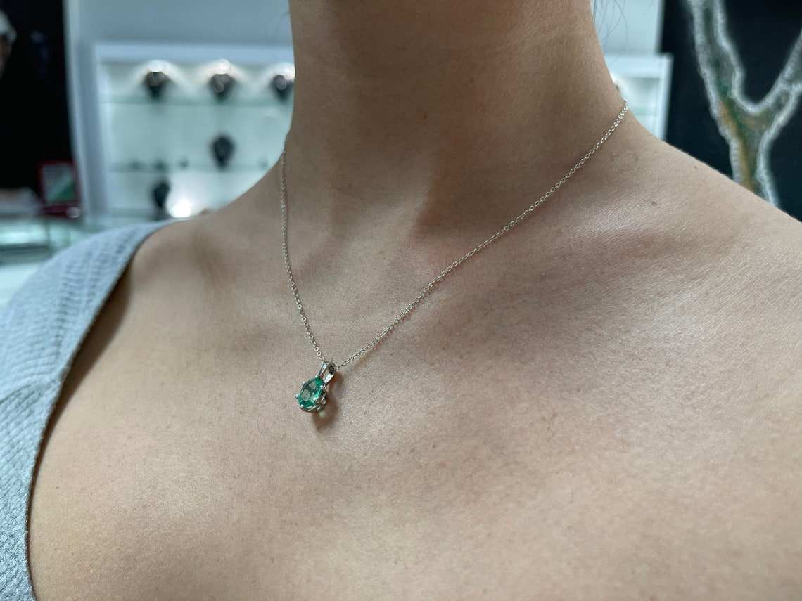 1.88 Carat Oval Cut Bright Green Colombian Emerald Six Prong Pendant