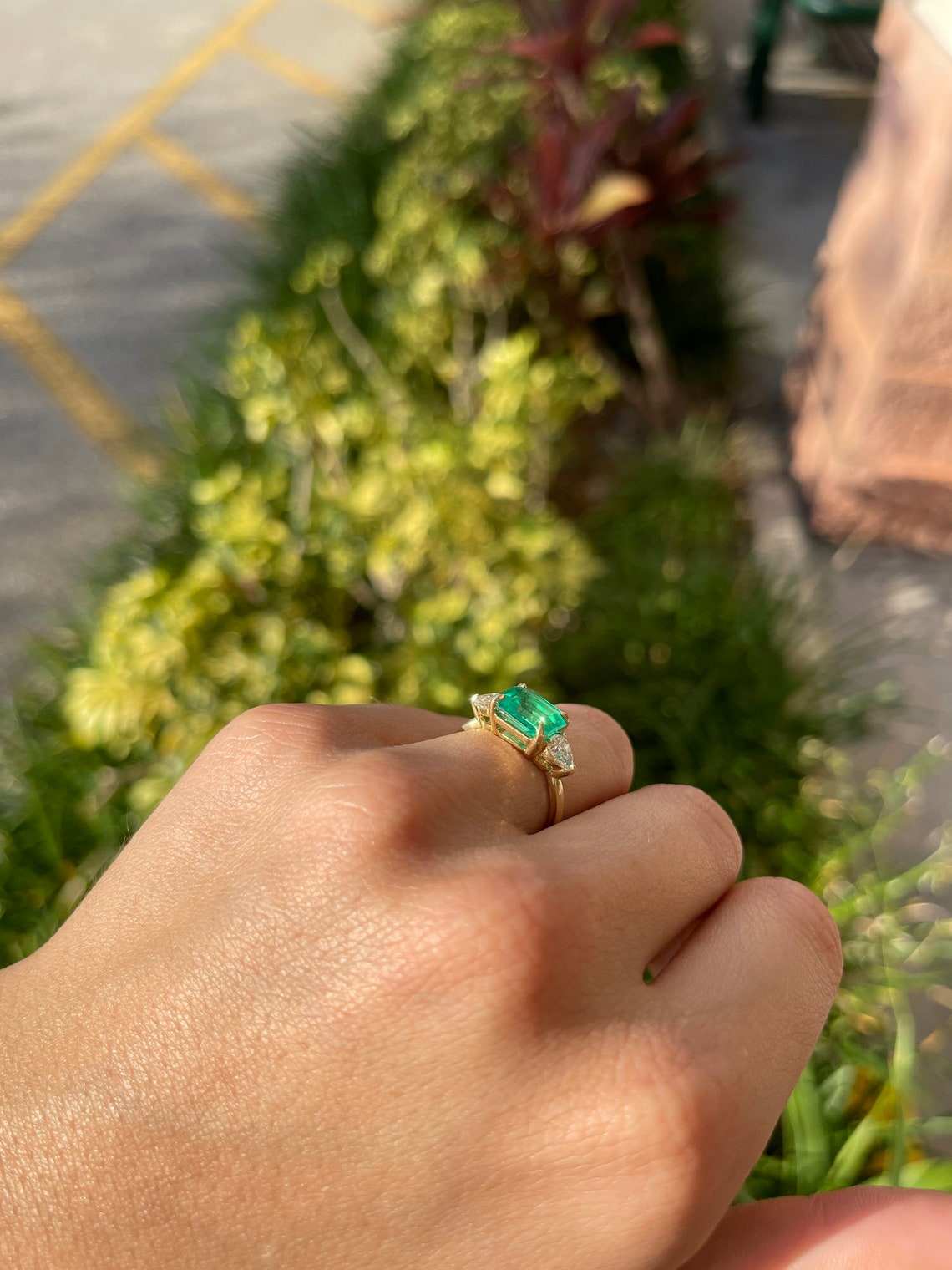 2.77tcw 18K Three Stone Emerald & Diamond Pear Cut Ring