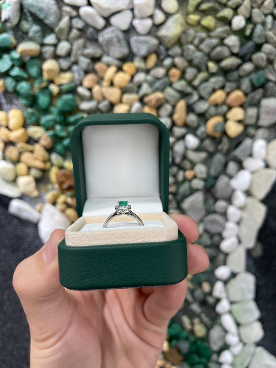 Celebrate Brilliance: 14K White Gold Ring Featuring 1.21tcw Natural Emerald Cut & Diamond Halo