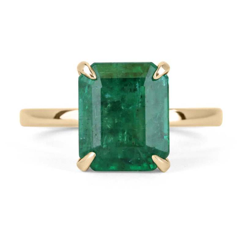 4.30ct emerald-cut emerald solitaire ring in 18K yellow gold setting
