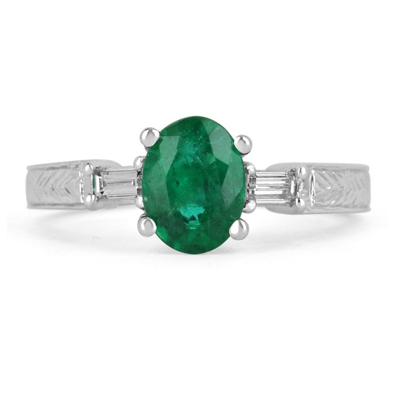 1.17tcw 14K white gold ring with natural oval cut emerald and diamond baguette accents