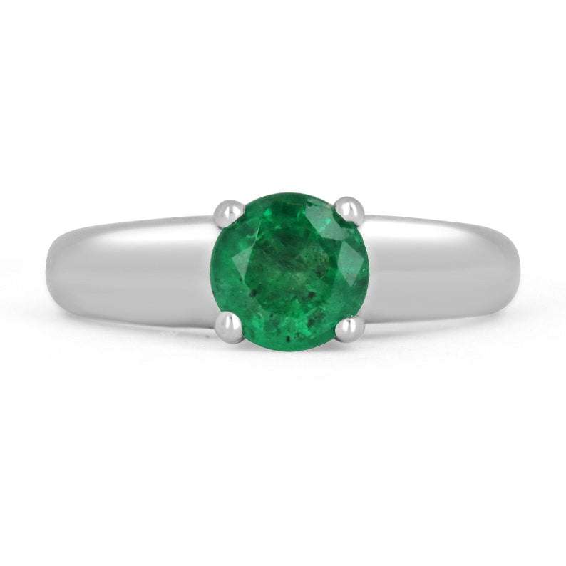 1.30-carat natural round cut emerald ring in 14K white gold with diamond accents