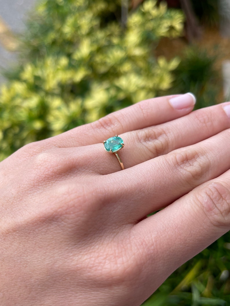 Celebrate Special Moments: 14K Gold Ring with 1.30cts Dainty Emerald Oval Cut Solitaire