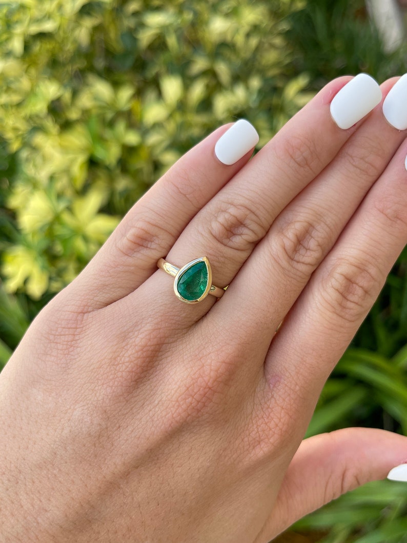 Emerald Bezel Solitaire Engagement Ring