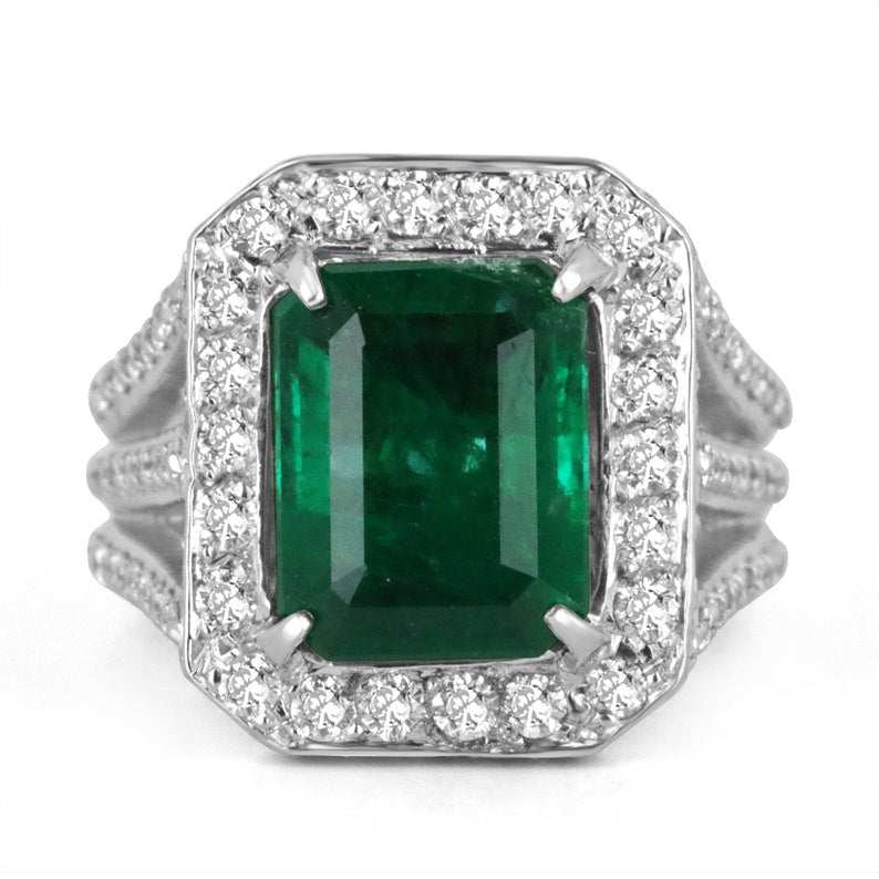 14K white gold ring with dark green emerald and diamond halo cocktail design