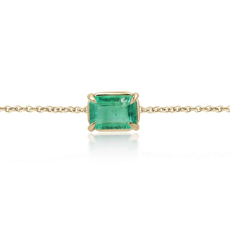 1.0 carat rich green natural emerald solitaire bracelet in 14K yellow gold claw prong setting