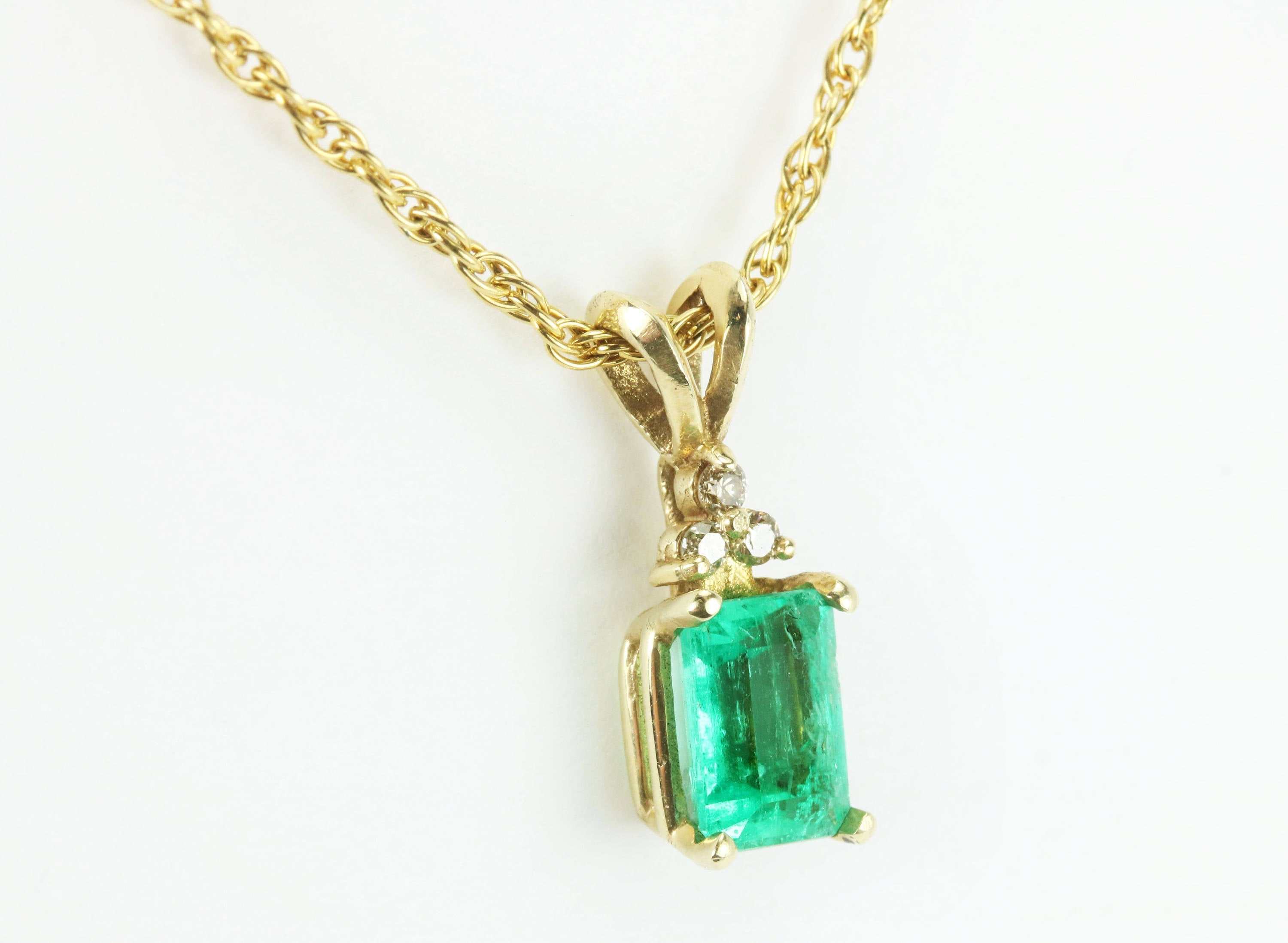 1.20tcw Emerald Cut Genuine Green Emerald & Diamond Accent Pendant