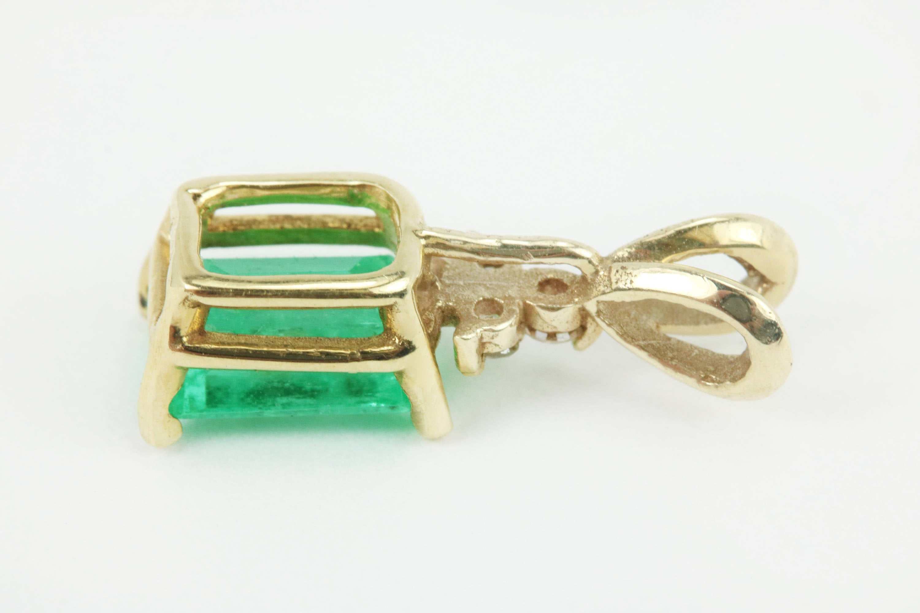 1.20tcw Emerald Cut Genuine Green Emerald & Diamond Accent Pendant