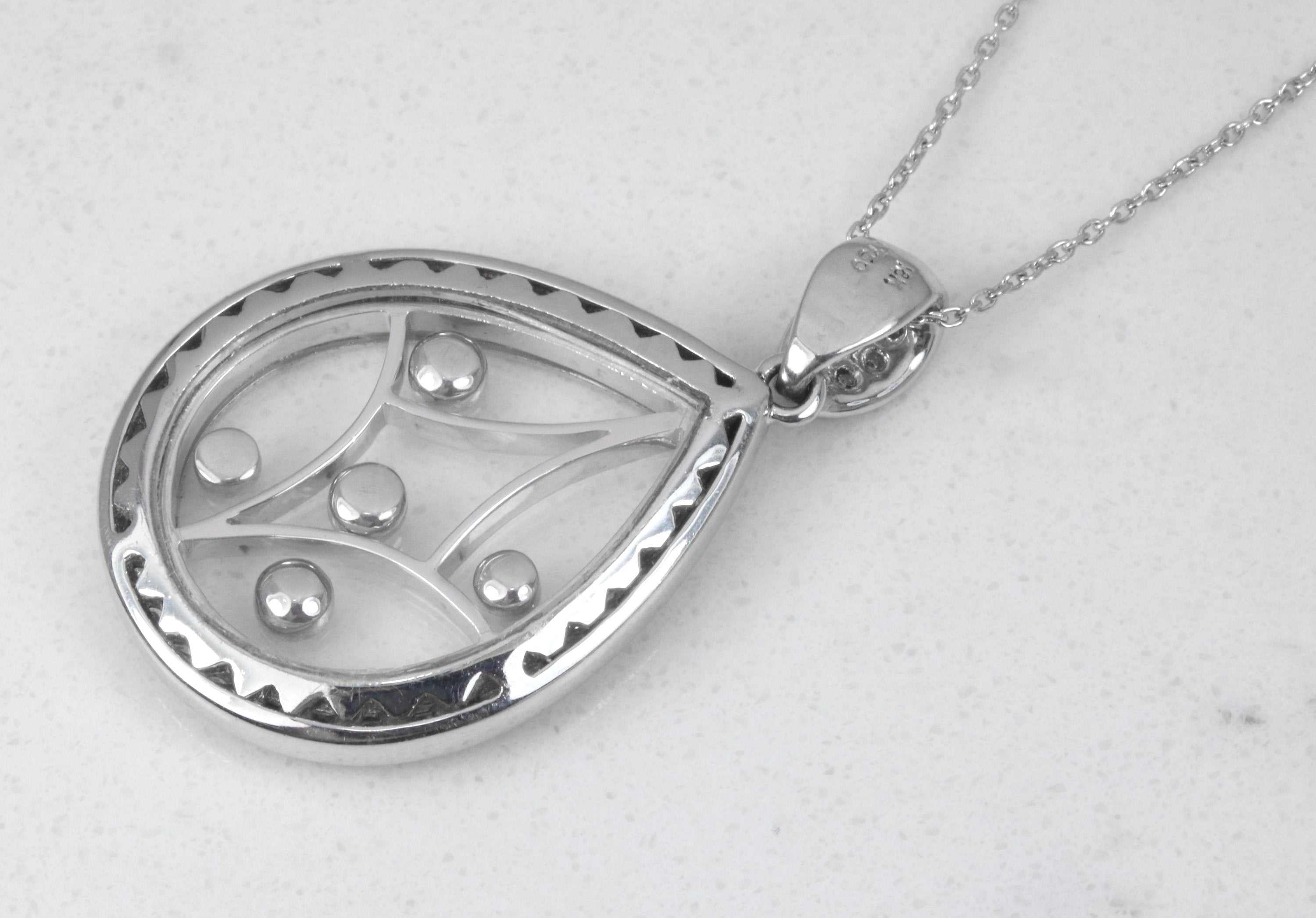 0.60pts Diamond - Camphor Glass Pendant 18K