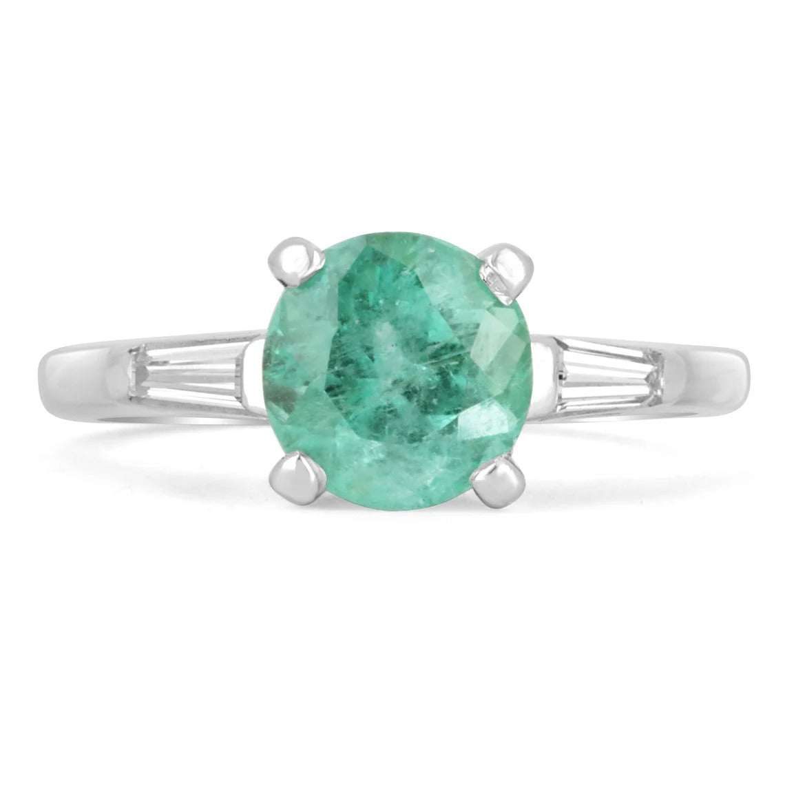 JR Colombian Emeralds platinum engagement ring with 1.70ctw three-stone design featuring round and baguette cut diamonds.