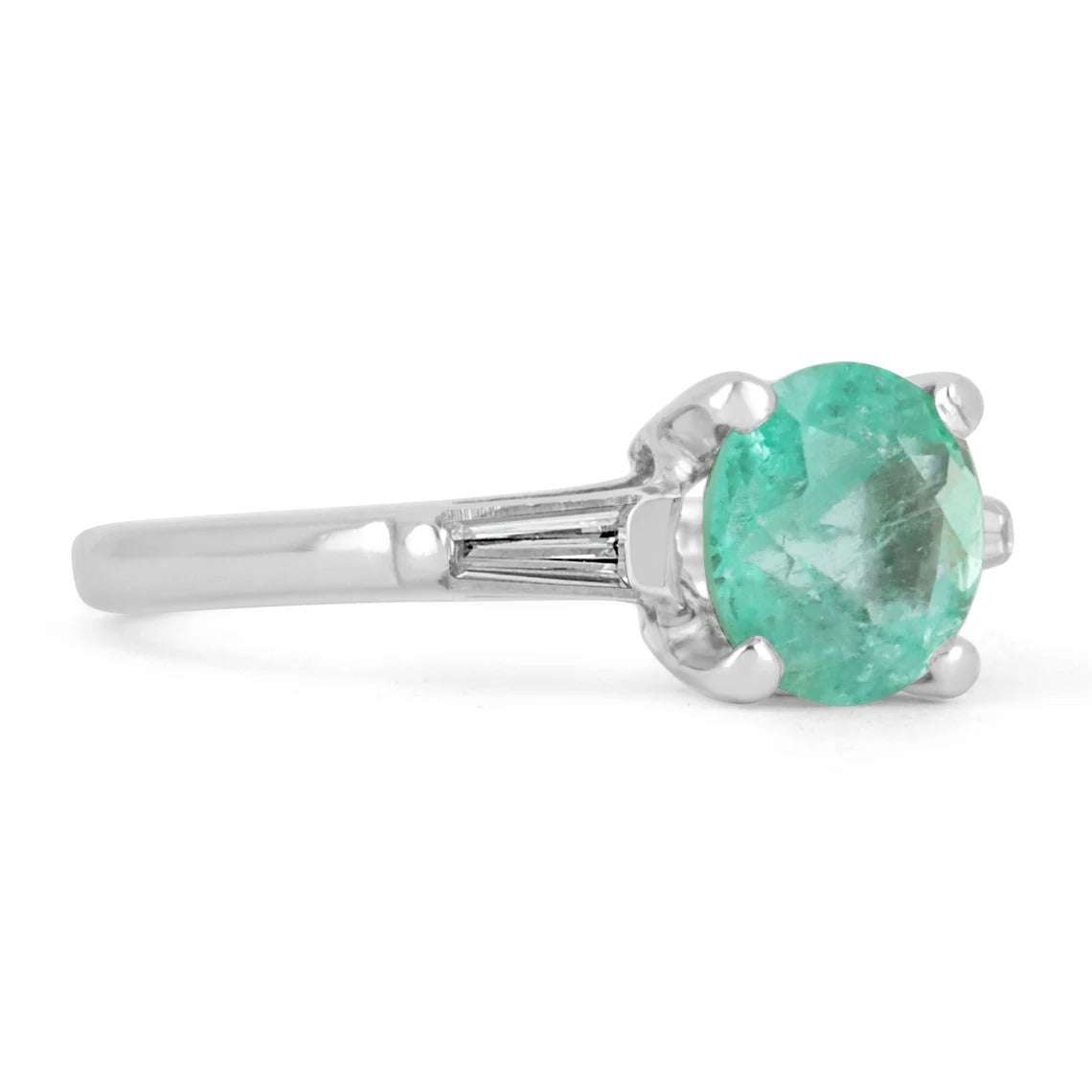 JR Colombian Emeralds three-stone platinum engagement ring with round and baguette-cut diamonds, featuring 1.70tcw total weight.