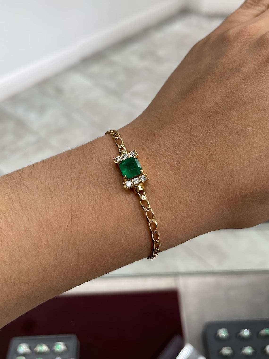 18K gold bracelet with 3.25tcw Colombian emerald Asscher cut stones and diamond accents by JR Colombian Emeralds.