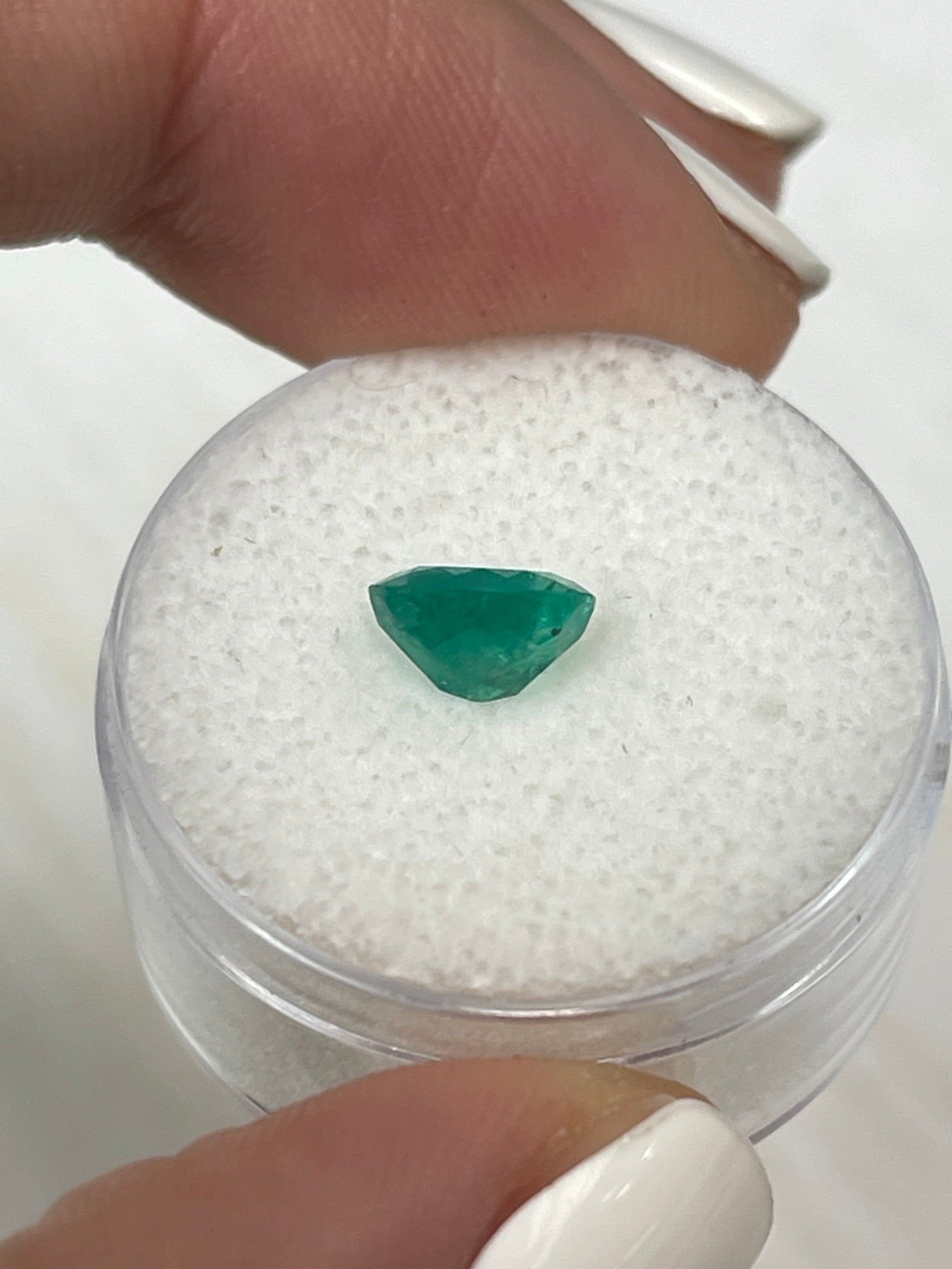 Oval cut 1.19 carat semi-transparent rich green natural Colombian emerald gemstone by JR Colombian Emeralds.