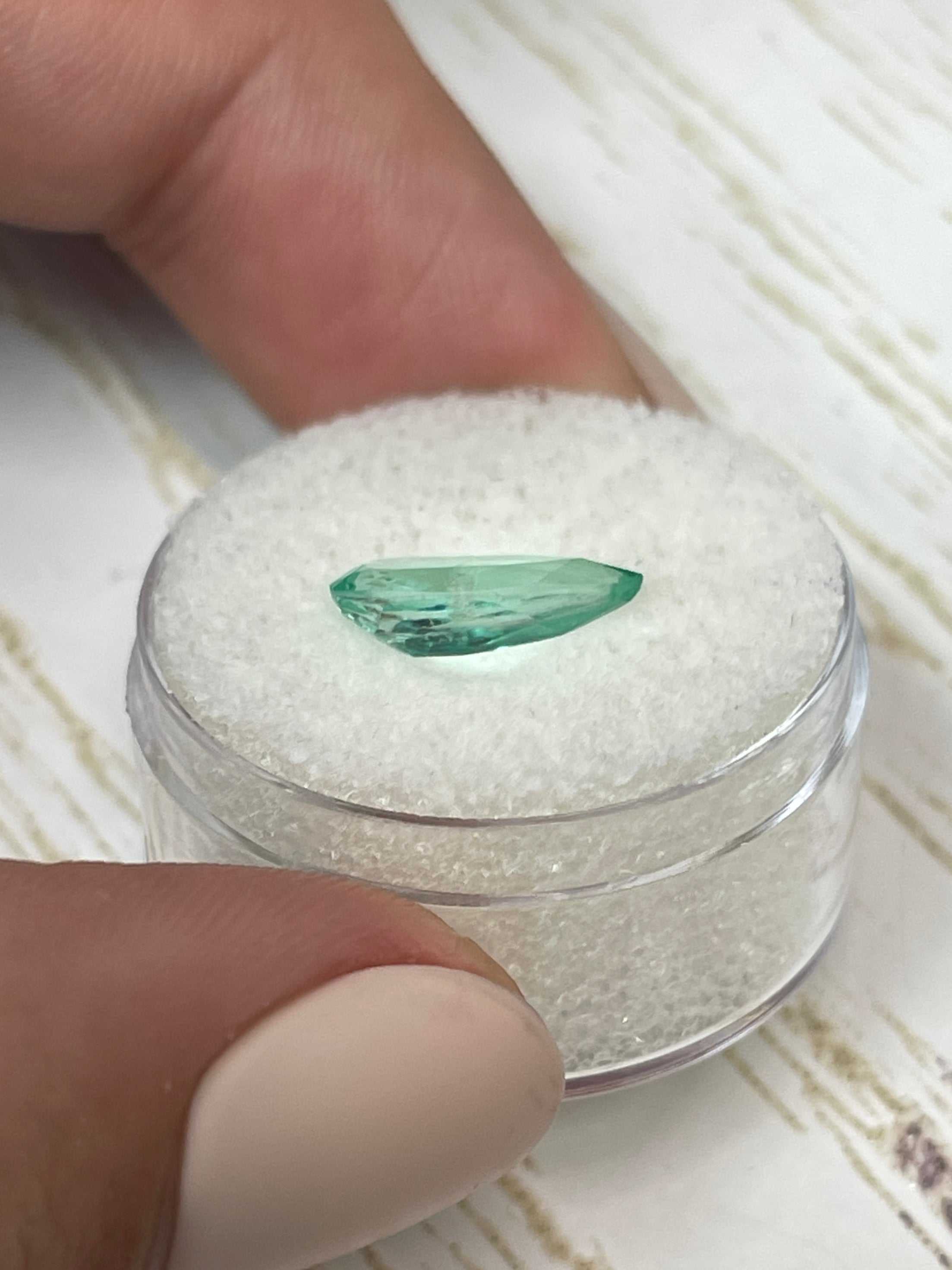 1.49 carat slender green natural Colombian emerald loose gemstone in pear cut from JR Colombian Emeralds.