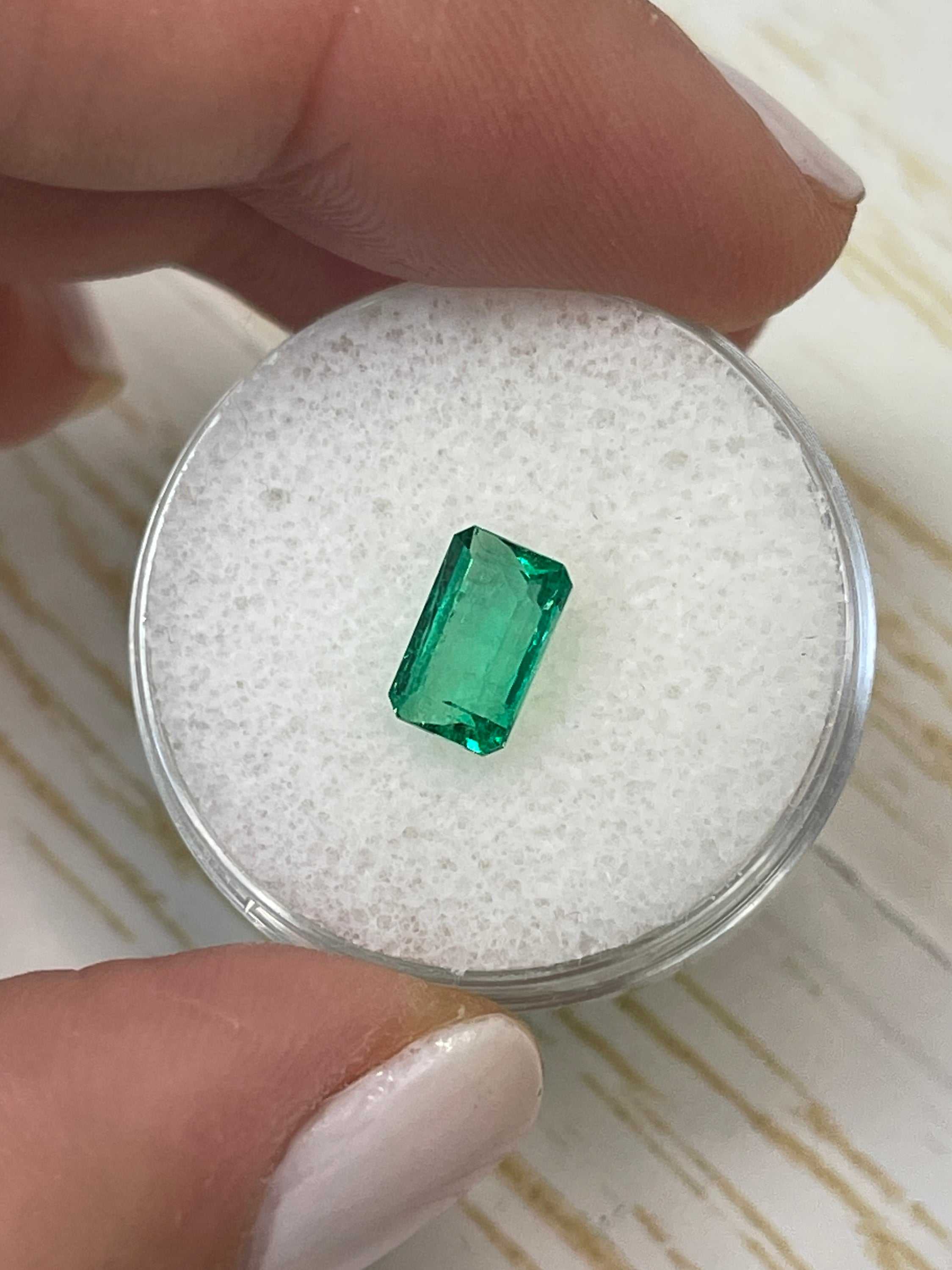 Elongated 8x5 mm Muzo green Colombian emerald loose gemstone, natural emerald cut, 1.50 carats, from JR Colombian Emeralds.