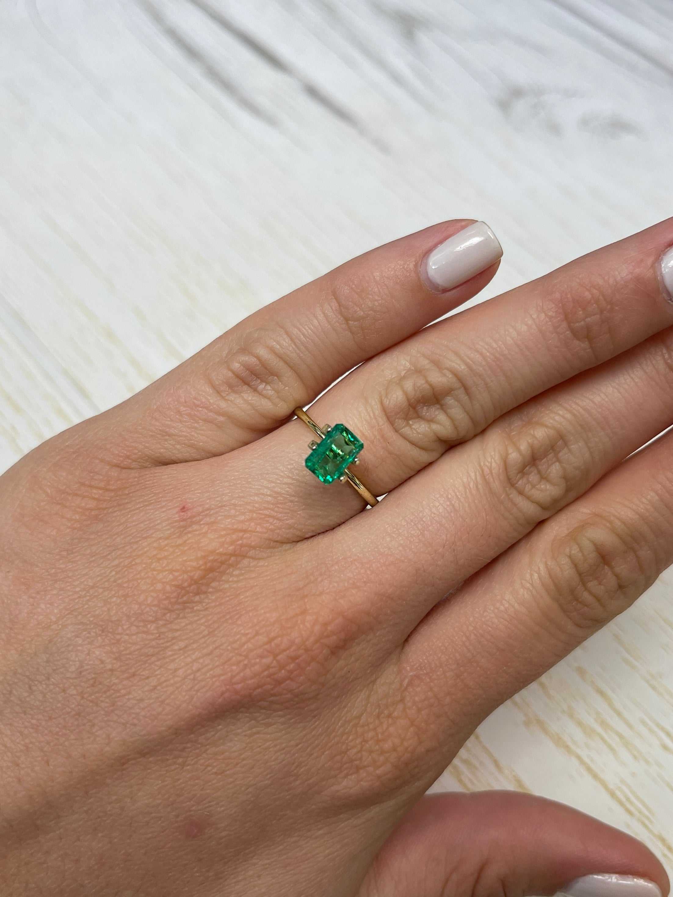 Elongated 8x5 Muzo green Colombian emerald loose gemstone, natural emerald cut, 1.50 carats, by JR Colombian Emeralds.