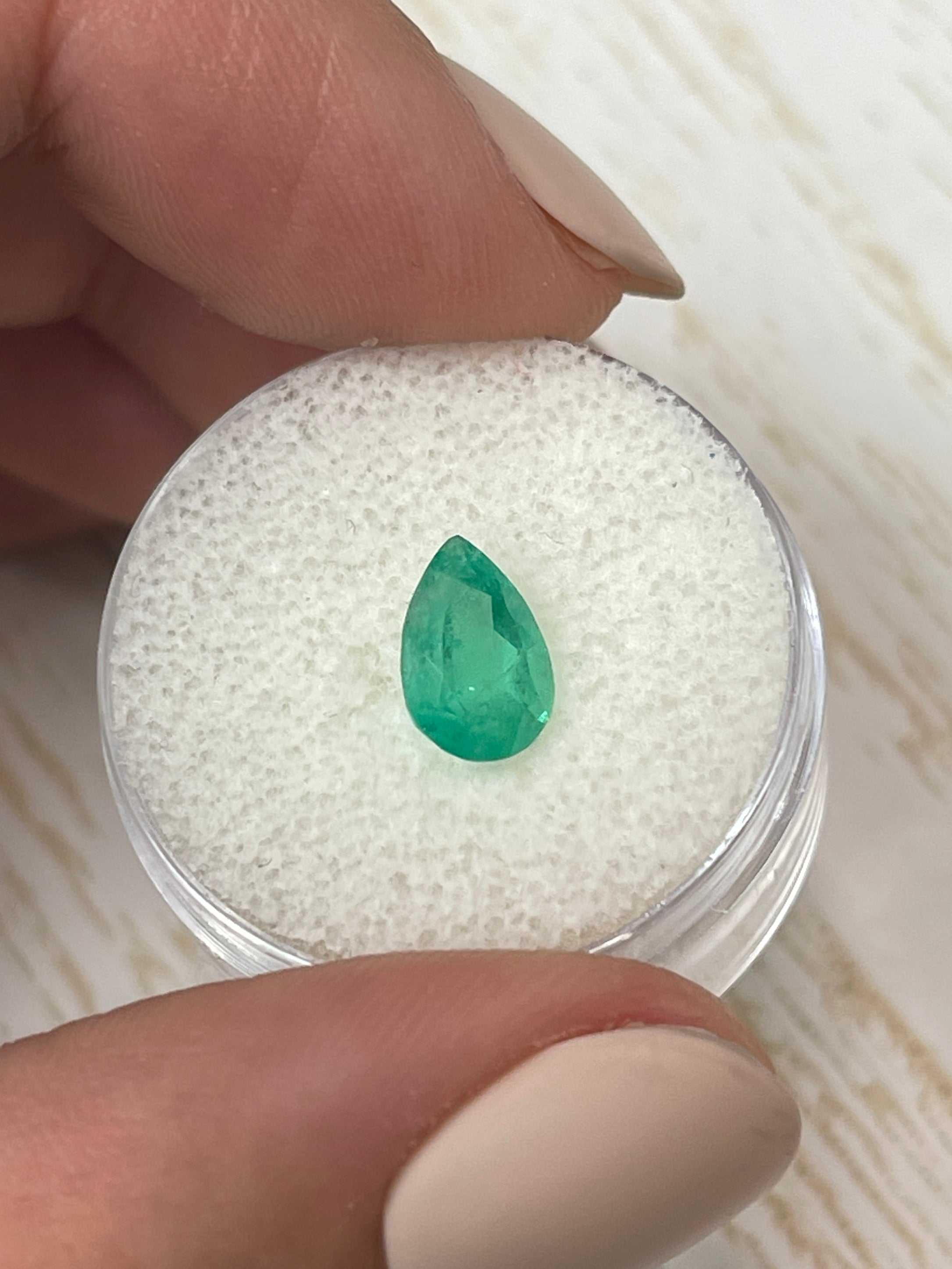1.58 carat medium green natural Colombian emerald loose gemstone in pear cut, from JR Colombian Emeralds.