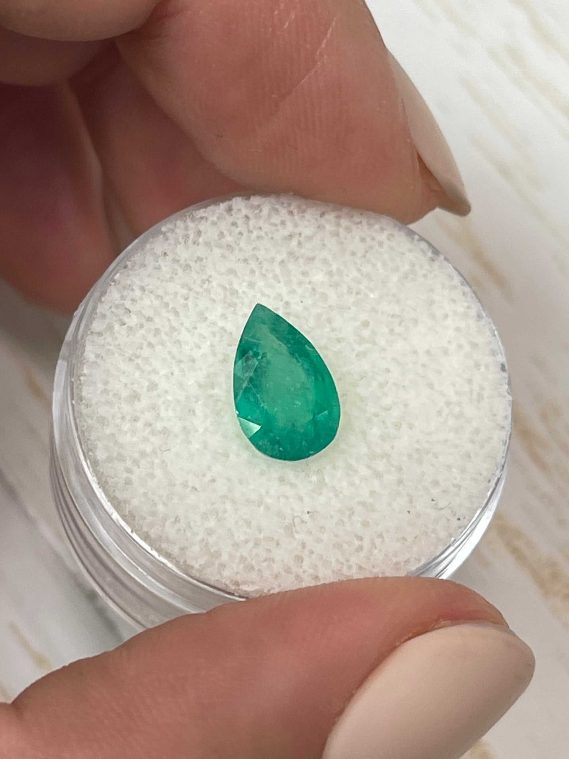 1.62 carat rich green natural Colombian emerald loose pear-cut gemstone from JR Colombian Emeralds.