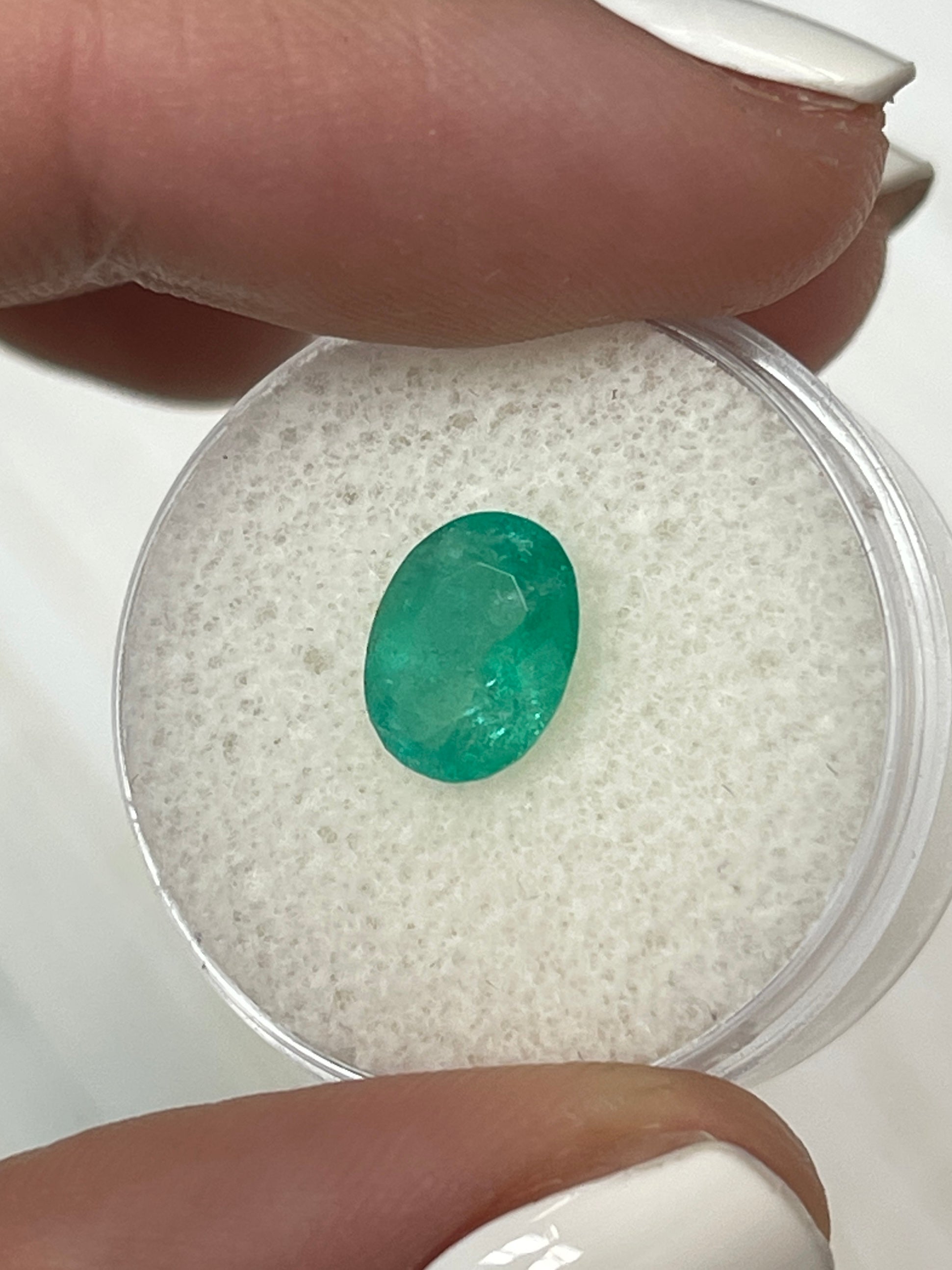 Natural loose Colombian emerald, 1.63 carats, bluish green, oval cut, cloudy appearance, from JR Colombian Emeralds.
