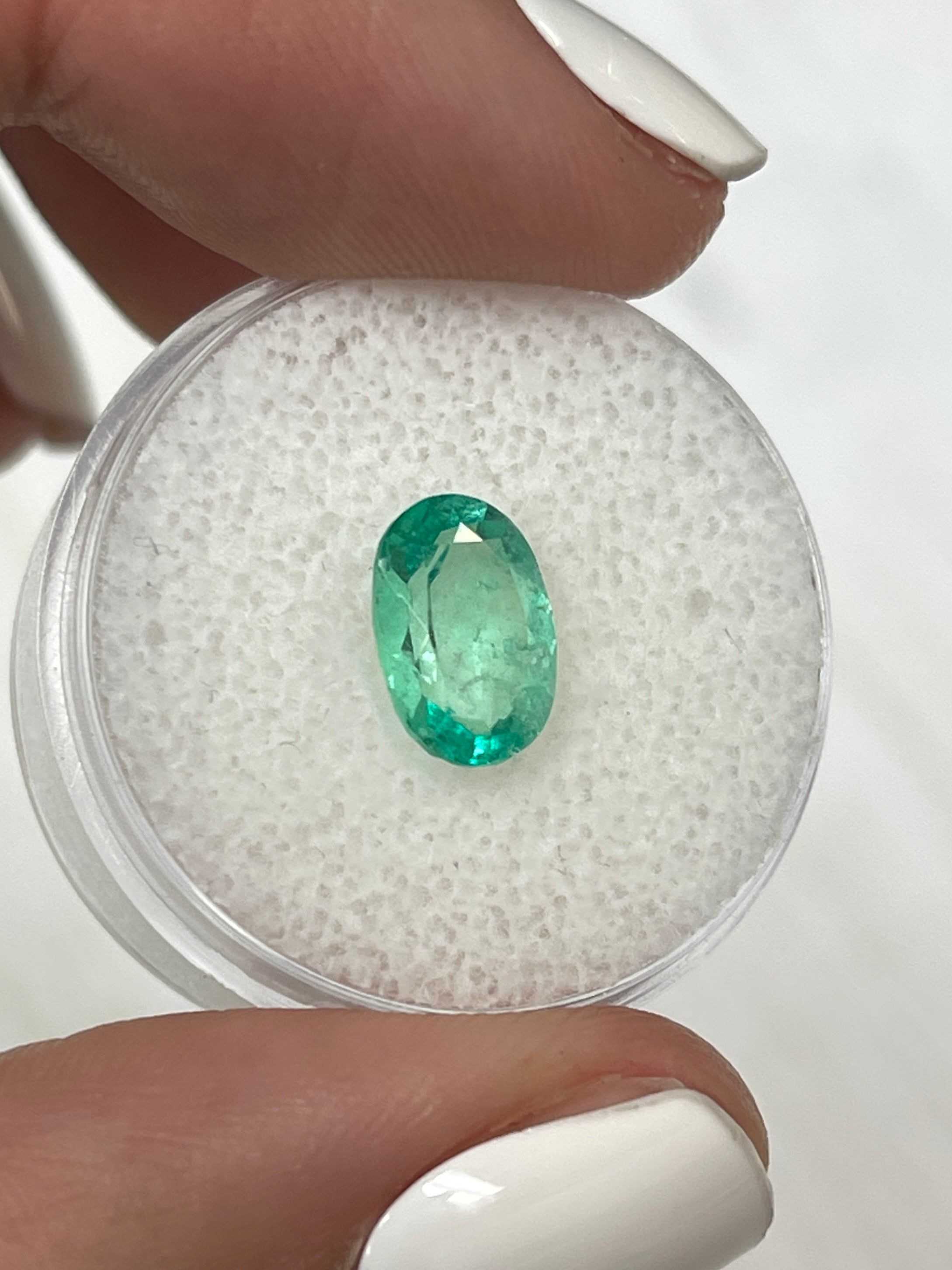 Natural 1.77 carat medium-light green Colombian emerald in oval cut, loose gemstone from JR Colombian Emeralds.