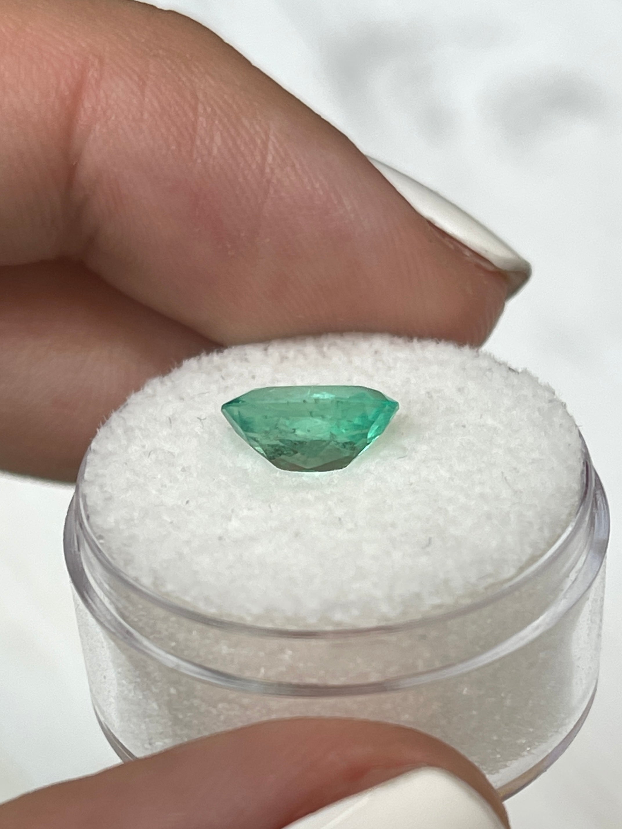1.77 carat medium-light green natural Colombian emerald loose oval cut gemstone by JR Colombian Emeralds.