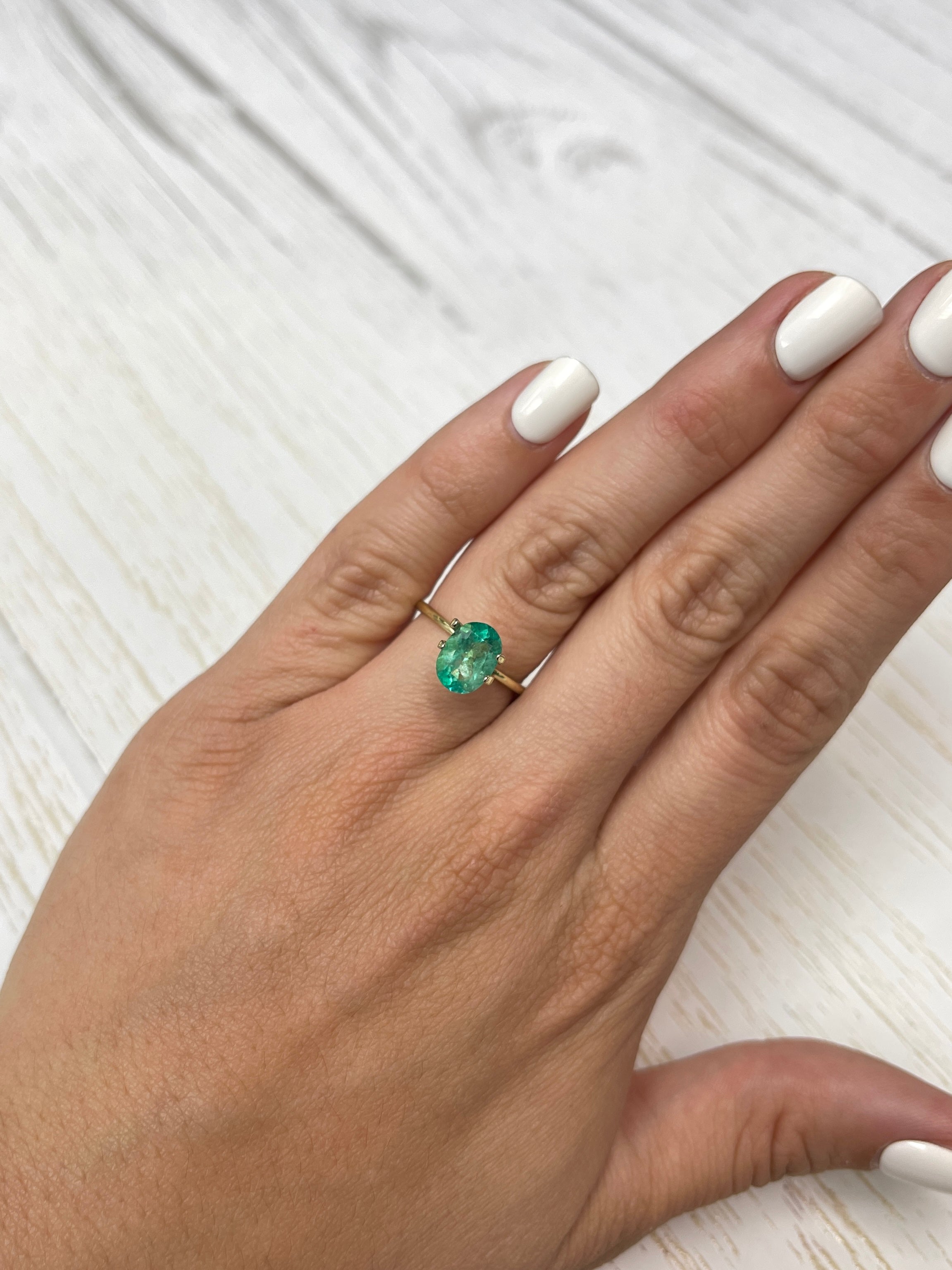 Oval-cut 1.77 Carat medium-light green Colombian emerald gemstone from JR Colombian Emeralds, natural loose stone.