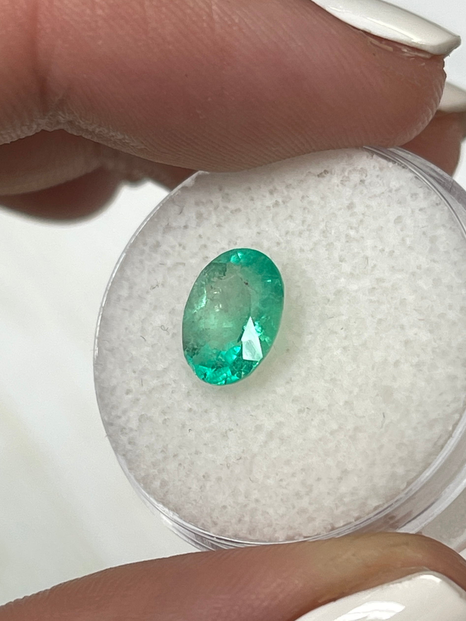 Medium light green 1.77 carat natural Colombian emerald loose gemstone with oval cut, from JR Colombian Emeralds.
