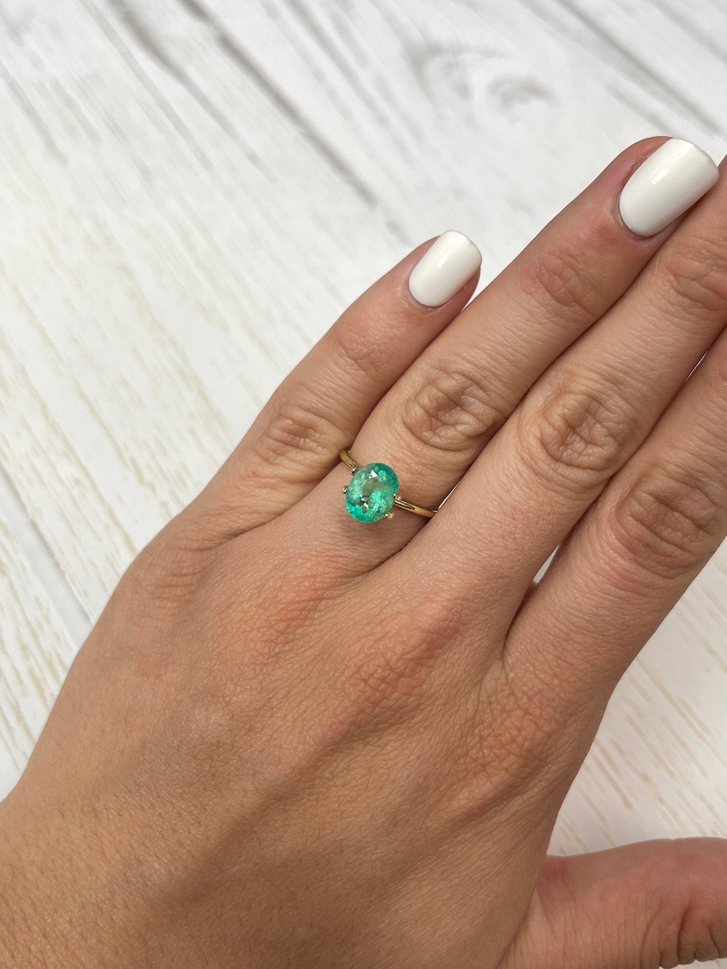 Medium light green 1.77 carat natural Colombian emerald loose oval cut from JR Colombian Emeralds.