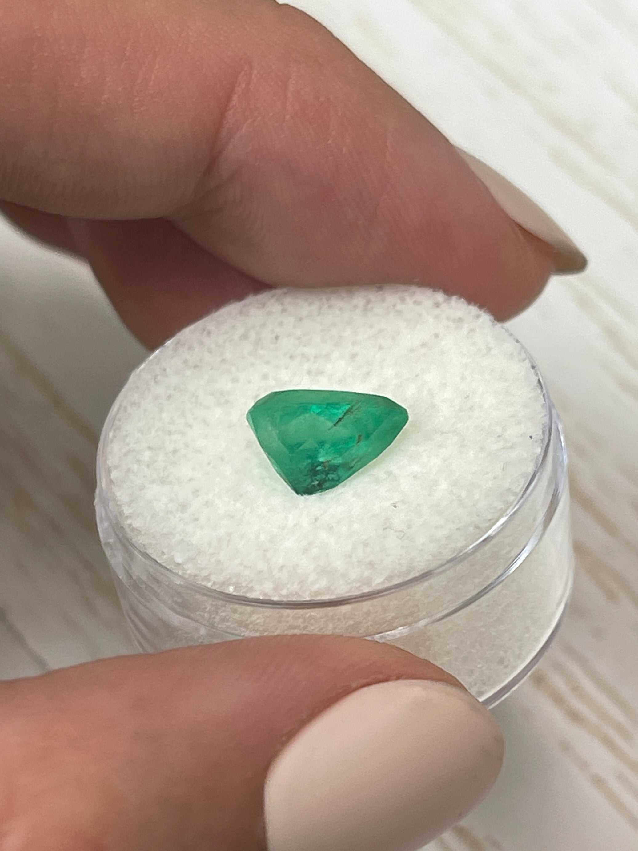 1.81 carat natural Colombian emerald loose pear-shaped gemstone in vibrant spring green color by JR Colombian Emeralds
