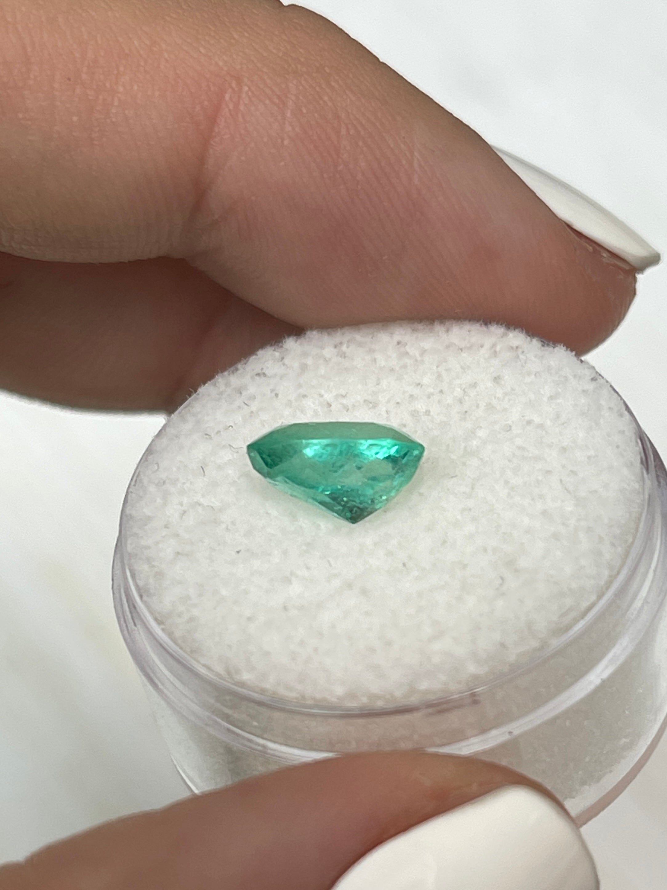 1.86 carat medium light green natural Colombian emerald loose oval cut gemstone by JR Colombian Emeralds.