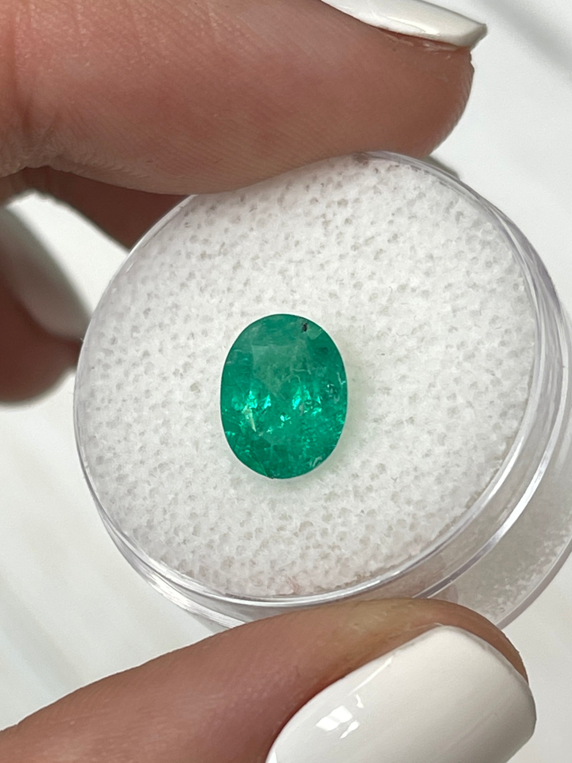 1.87 Carat green Colombian emerald loose oval cut gemstone from JR Colombian Emeralds, natural and high-quality.