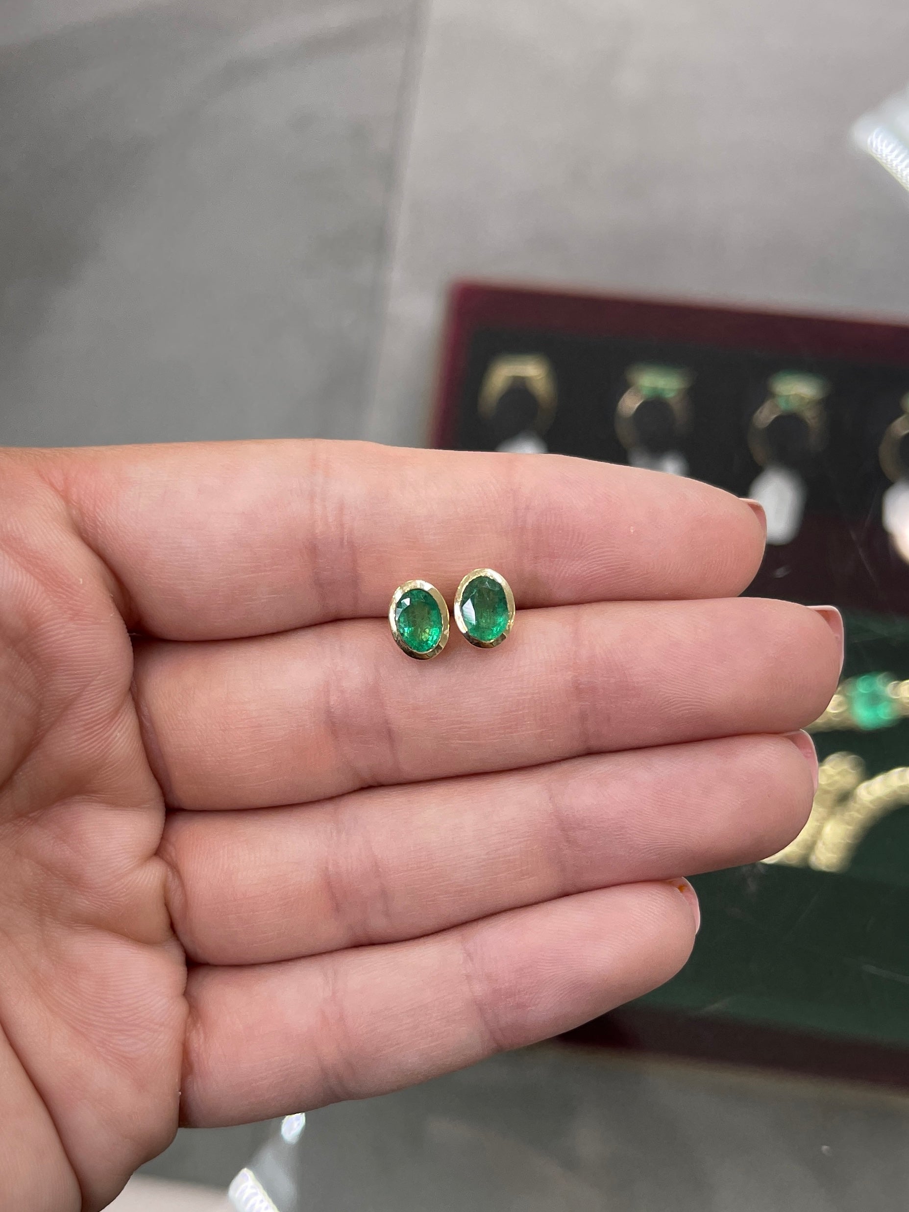14K gold stud earrings with 1.87tcw oval cut natural emeralds in bezel setting, from JR Colombian Emeralds.