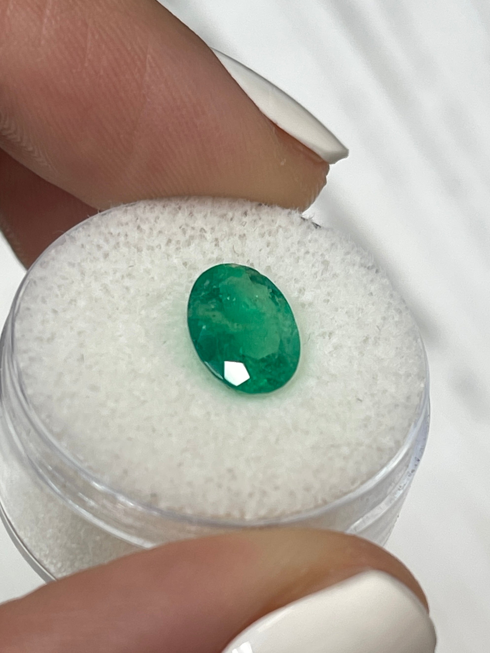 Natural 1.94 carat green Colombian emerald loose oval cut gemstone from JR Colombian Emeralds.