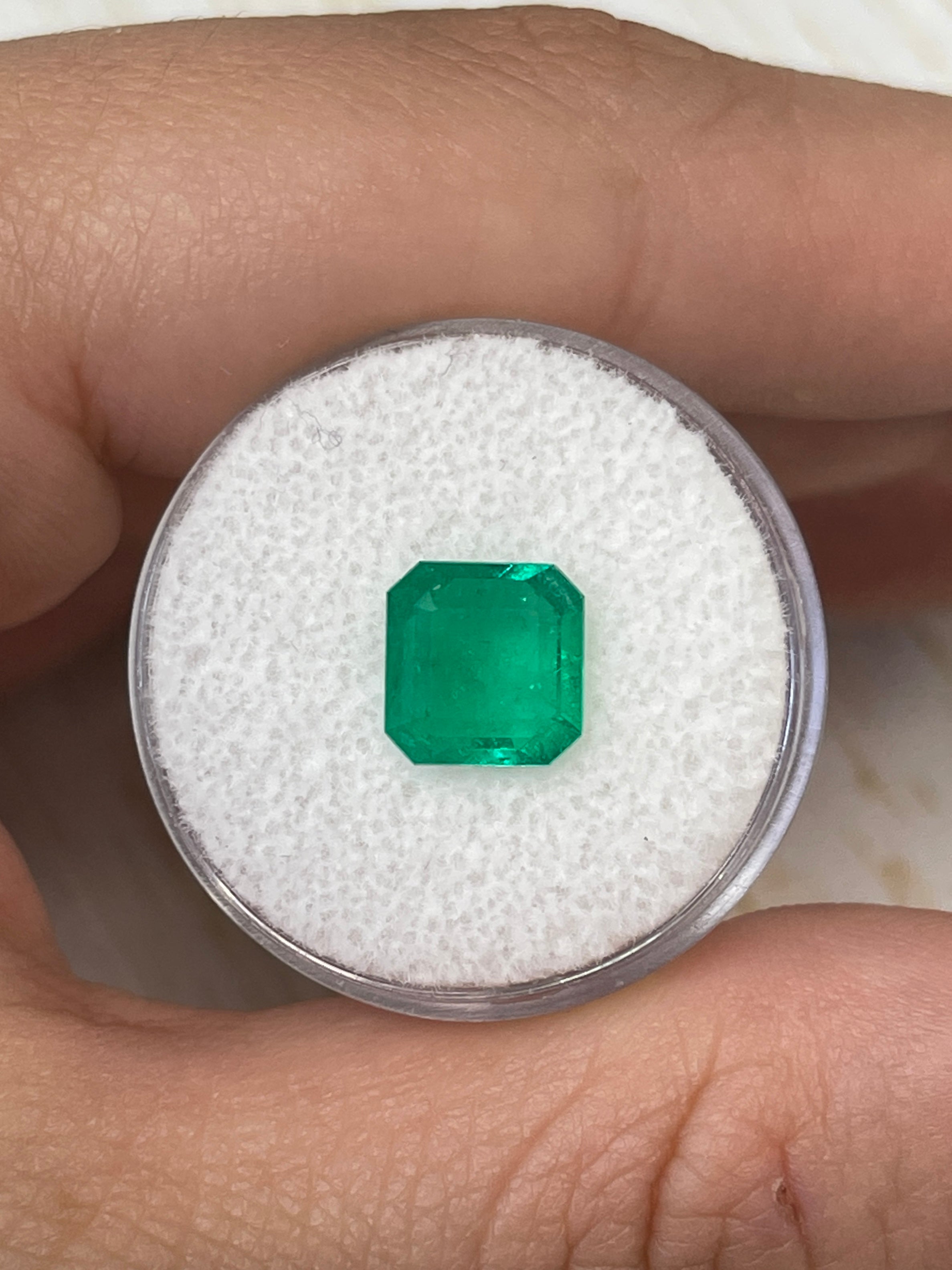 1.97 carat Muzo green Colombian emerald loose Asscher cut gemstone from JR Colombian Emeralds, natural and vibrant green.