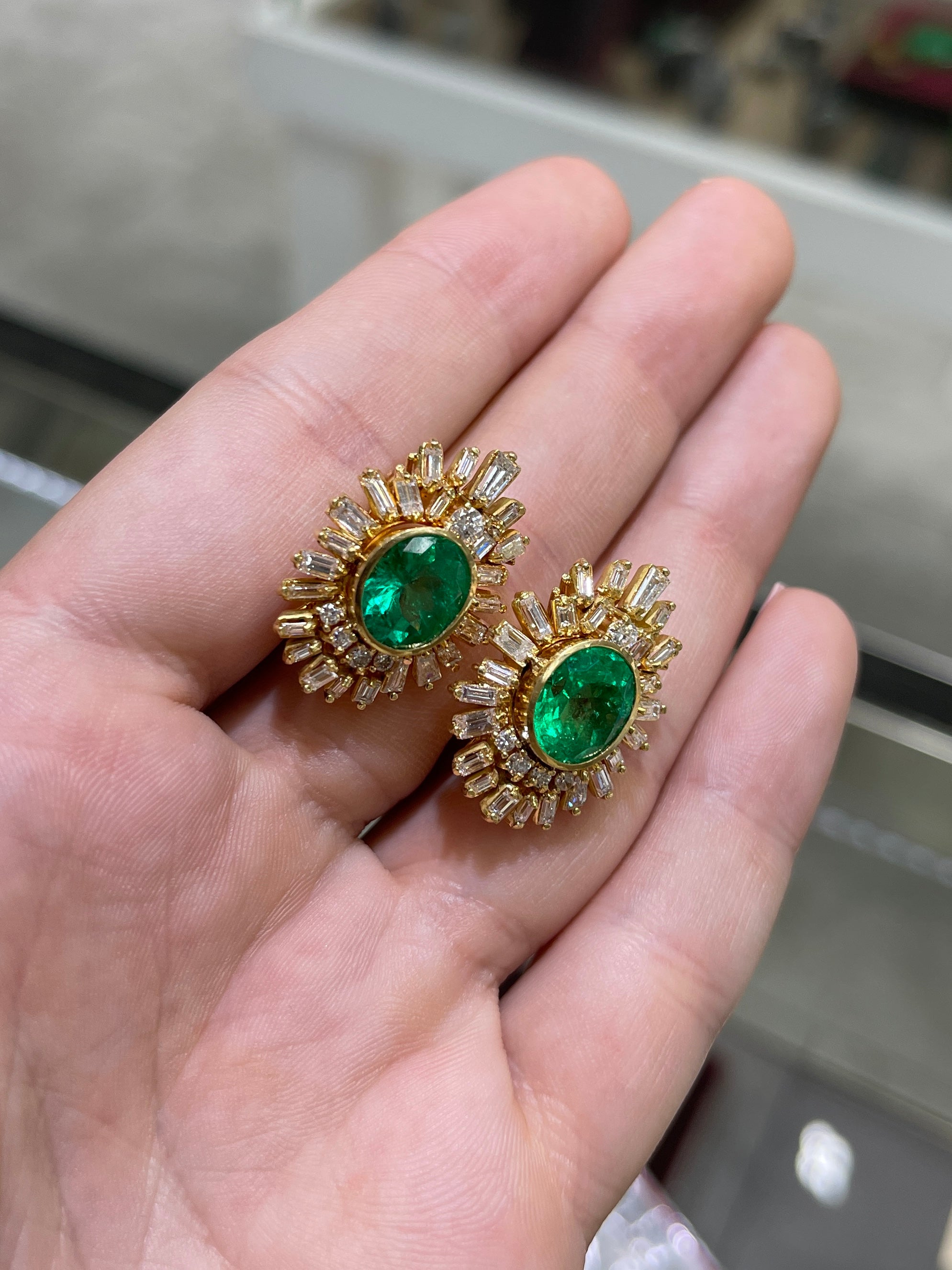 Jewelry image of 12.20ctw AAA+ oval Colombian emerald and diamond statement earrings by JR Colombian Emeralds.