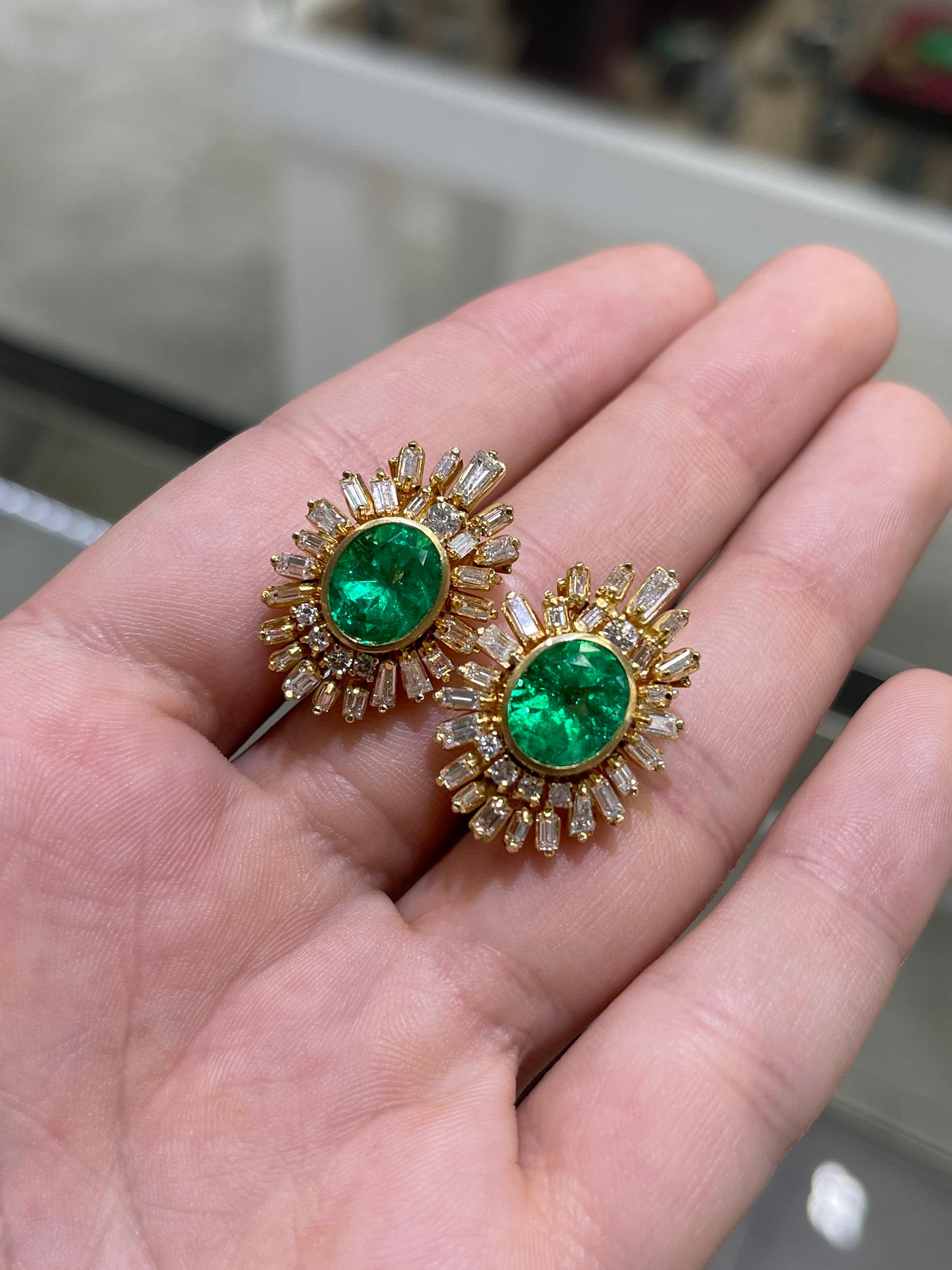 AAA+ oval Colombian emerald and diamond statement earrings by JR Colombian Emeralds, featuring 12.20tcw of sparkling gemstones.