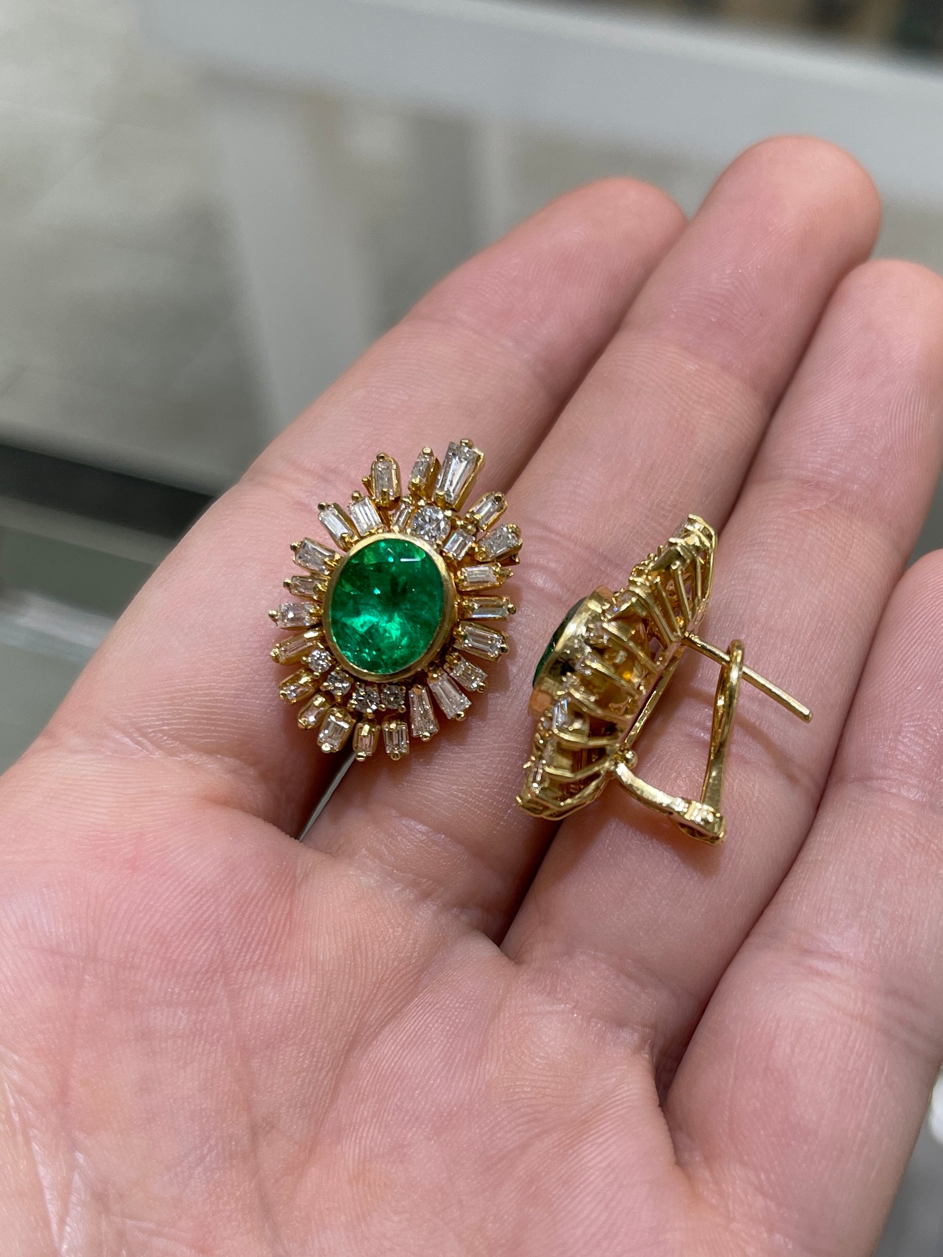 13.20tcw AAA+ oval Colombian emerald and diamond statement earrings by JR Colombian Emeralds, featuring vibrant green emeralds and sparkling diamonds.
