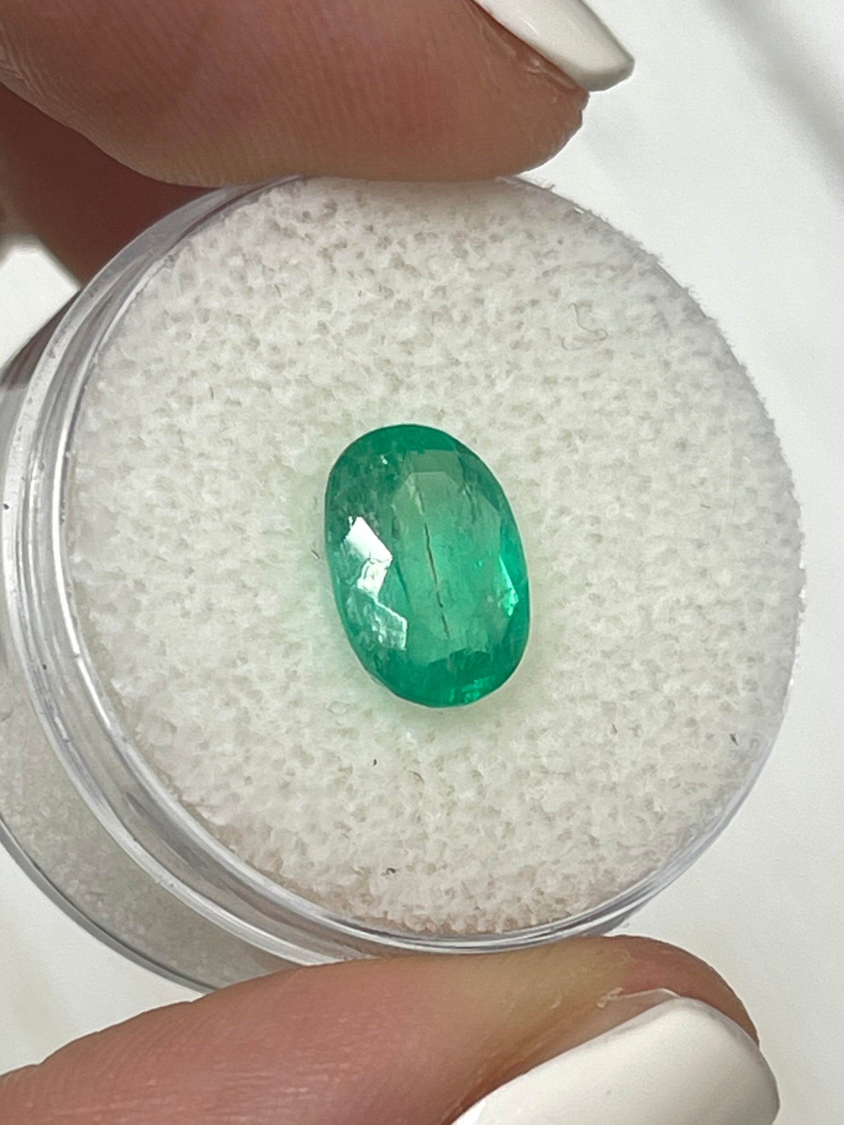 2.19 carat natural green Colombian emerald loose oval cut gemstone from JR Colombian Emeralds, highlighting its vibrant color and clarity.